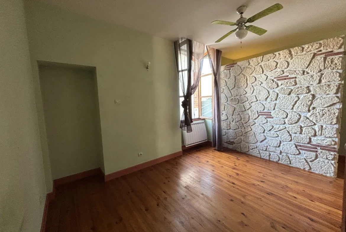 Maison de ville avec cour et charme authentique à Fleurance 