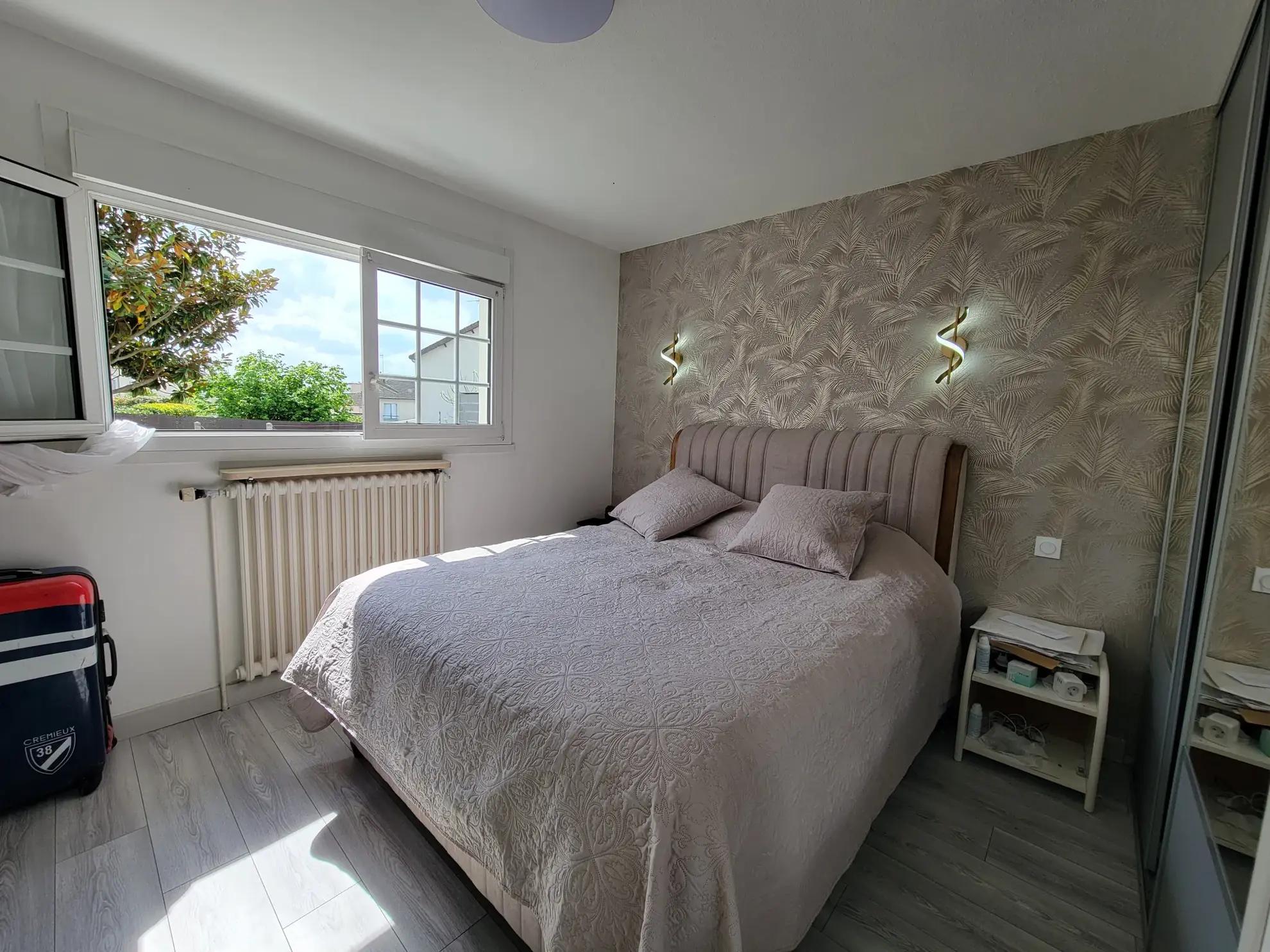 Maison de plain-pied rénovée avec garage et jardin au Mans 