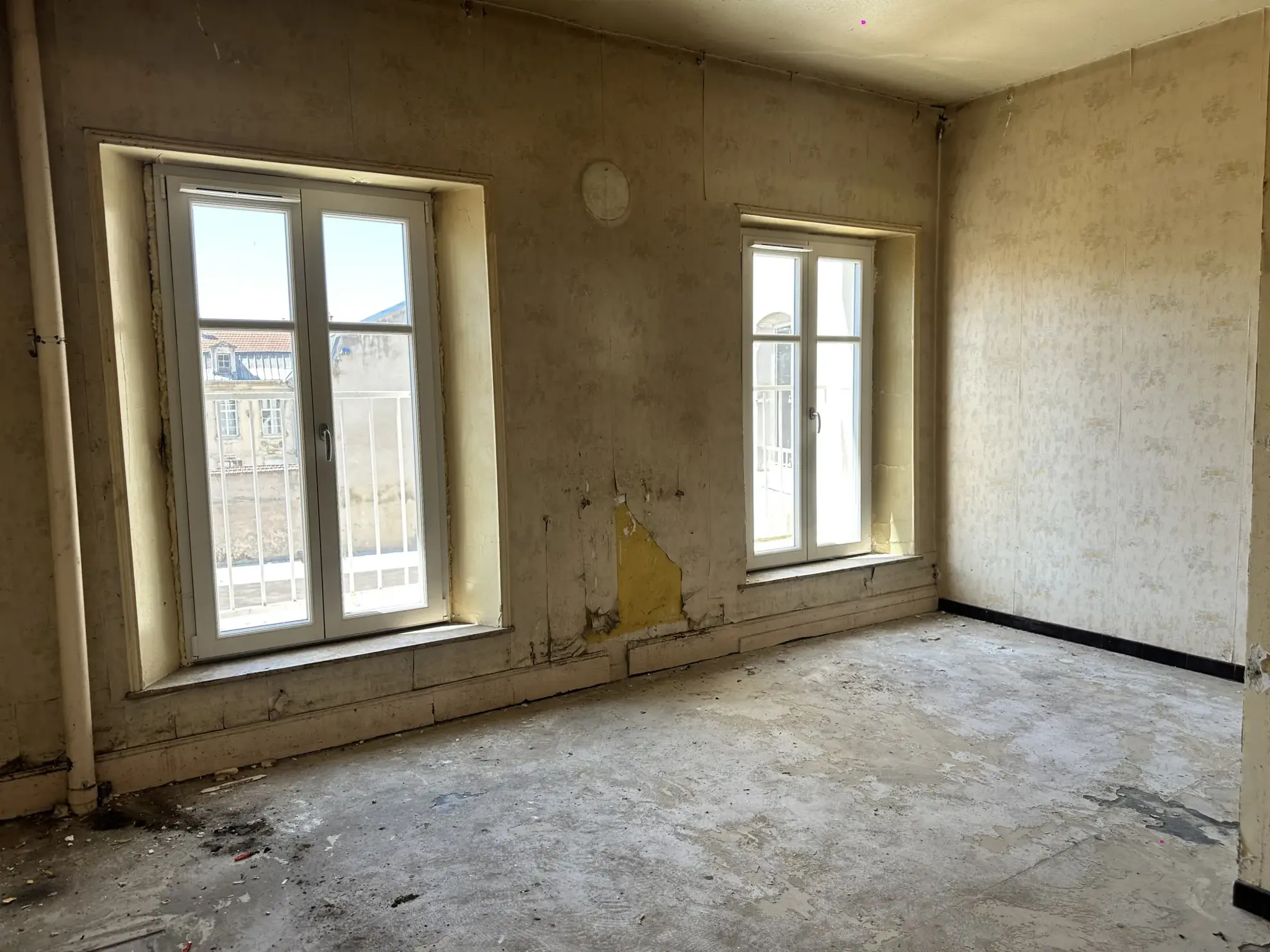 Appartement F3 à Toul de 107 m² avec fort potentiel de rénovation 