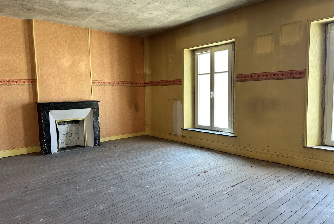 Appartement F3 à Toul de 107 m² avec fort potentiel de rénovation 