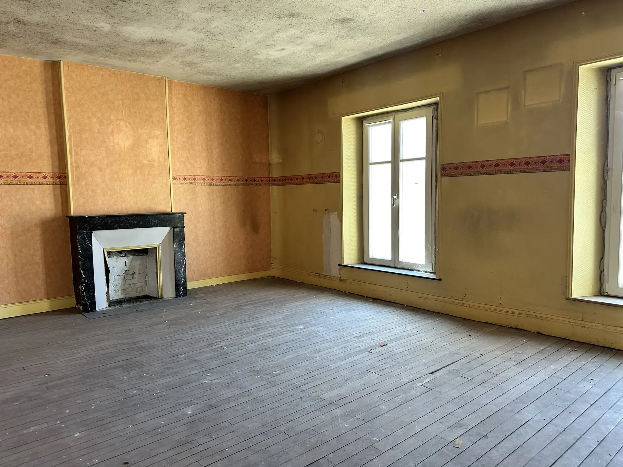 Appartement F3 à Toul de 107 m² avec fort potentiel de rénovation 