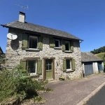Maison en pierre à Cornil (19) avec dépendances et terrain de 360 m²