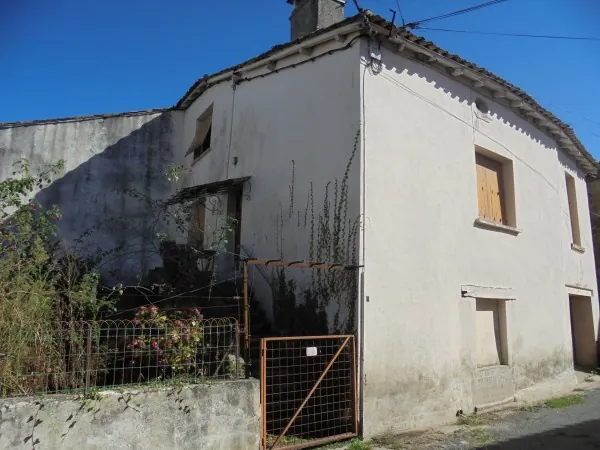 Ensemble immobilier avec 2 maisons, garage et jardin à La Réole 