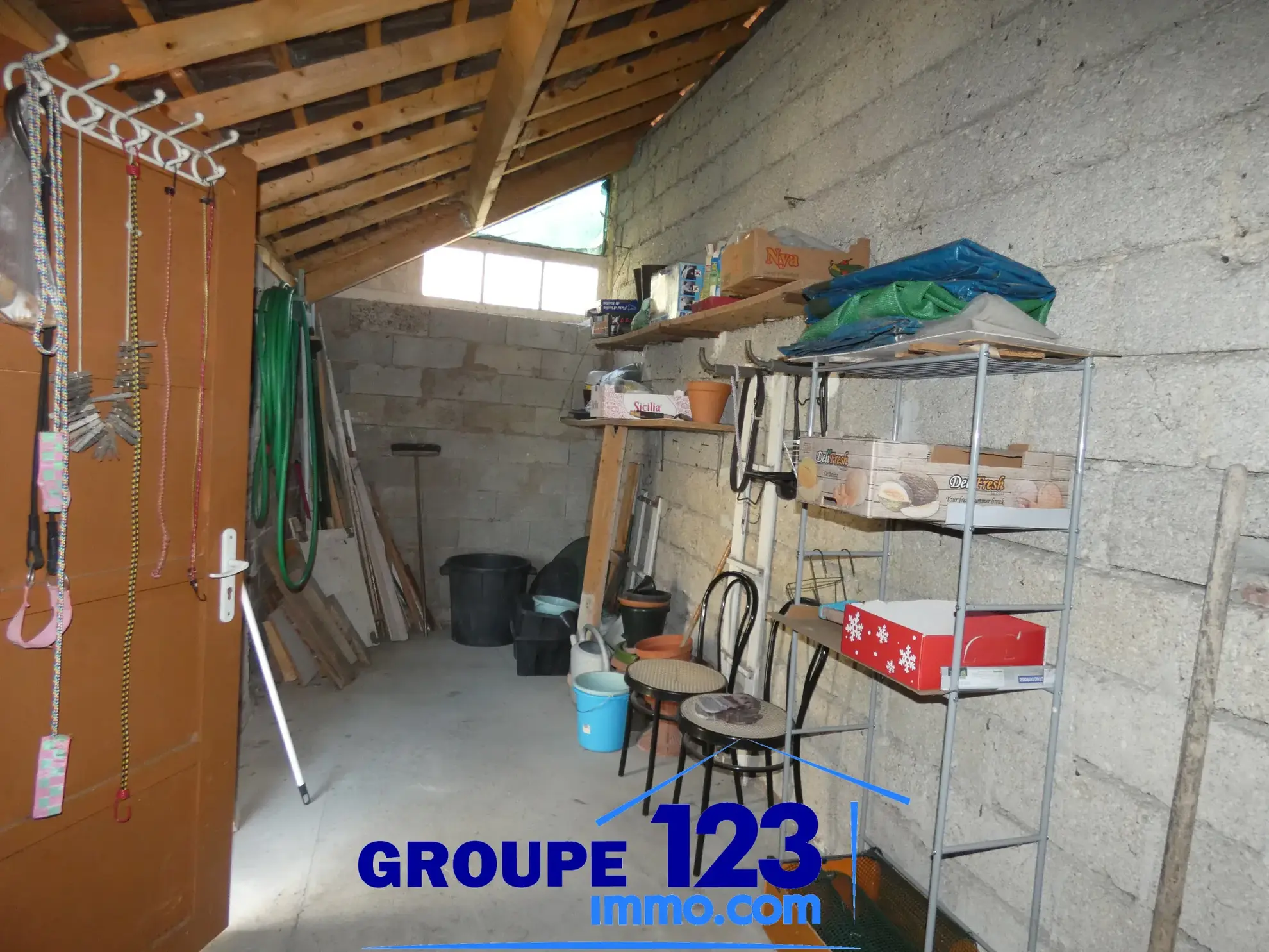 Maison à vendre à Migennes avec 3 chambres, atelier et terrain arboré 