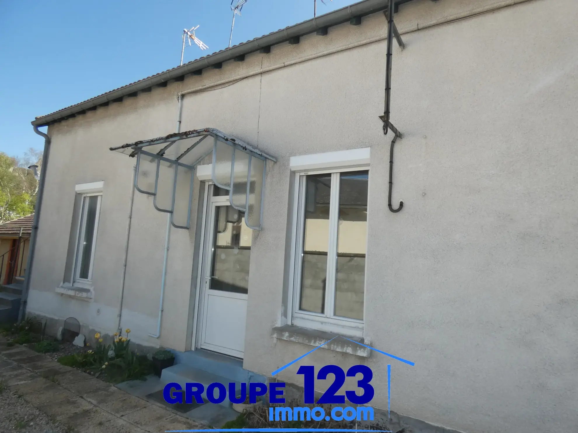 Maison à vendre à Migennes avec 3 chambres, atelier et terrain arboré 