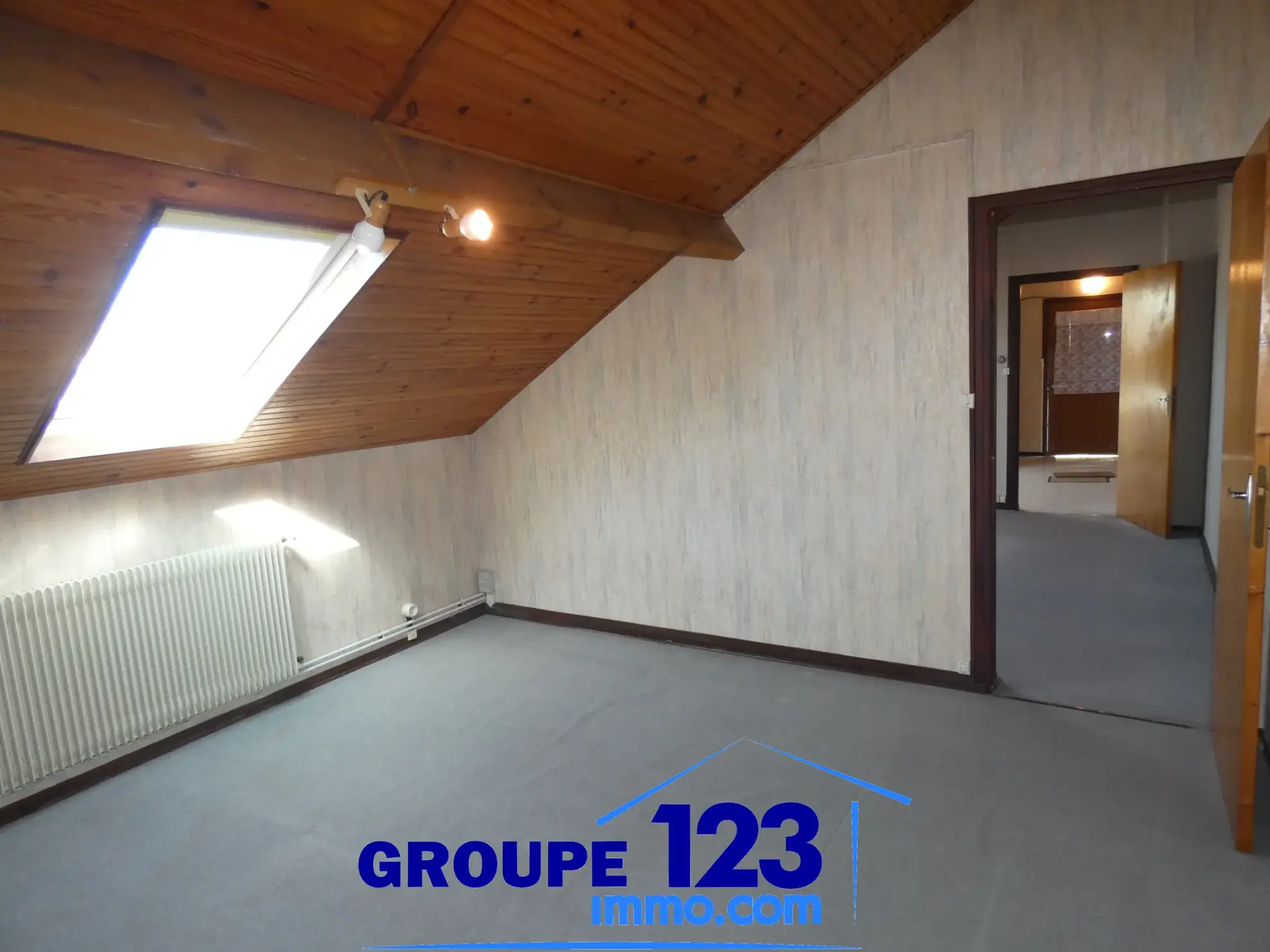 Maison à vendre à Migennes avec 3 chambres, atelier et terrain arboré 