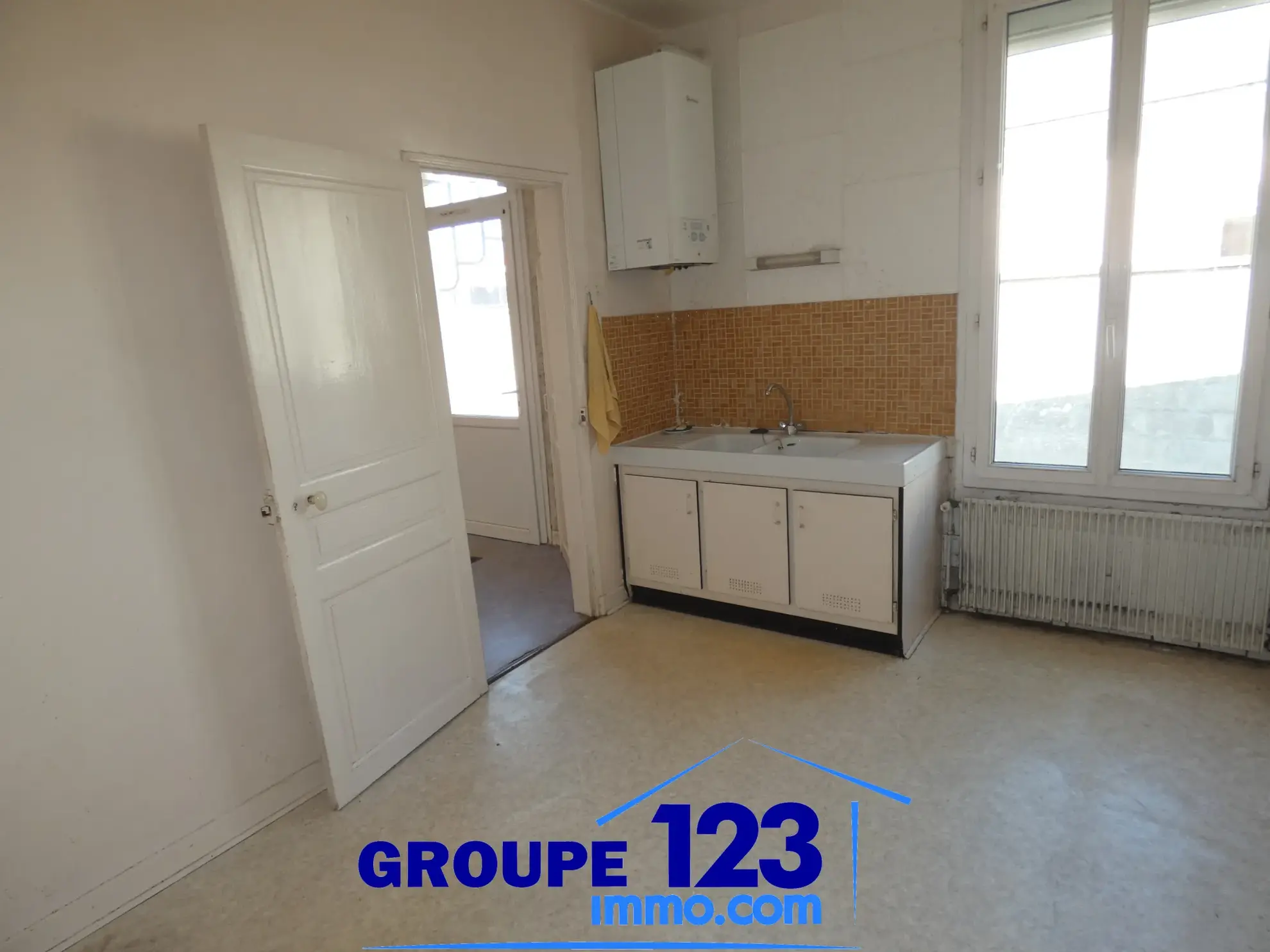 Maison à vendre à Migennes avec 3 chambres, atelier et terrain arboré 