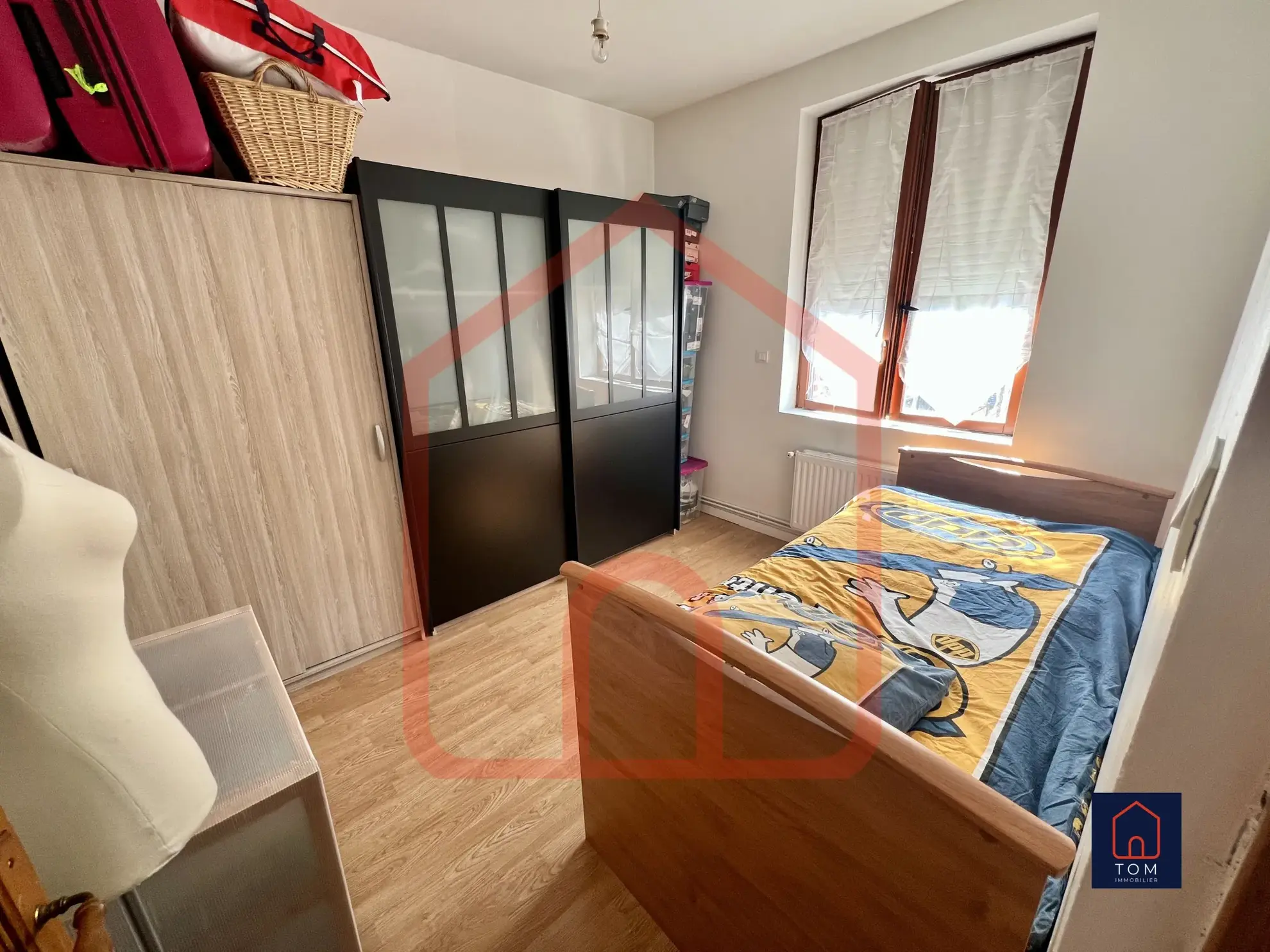 Maison ancienne rénovée avec 3 chambres, jardin et sous-sol à Lezennes 