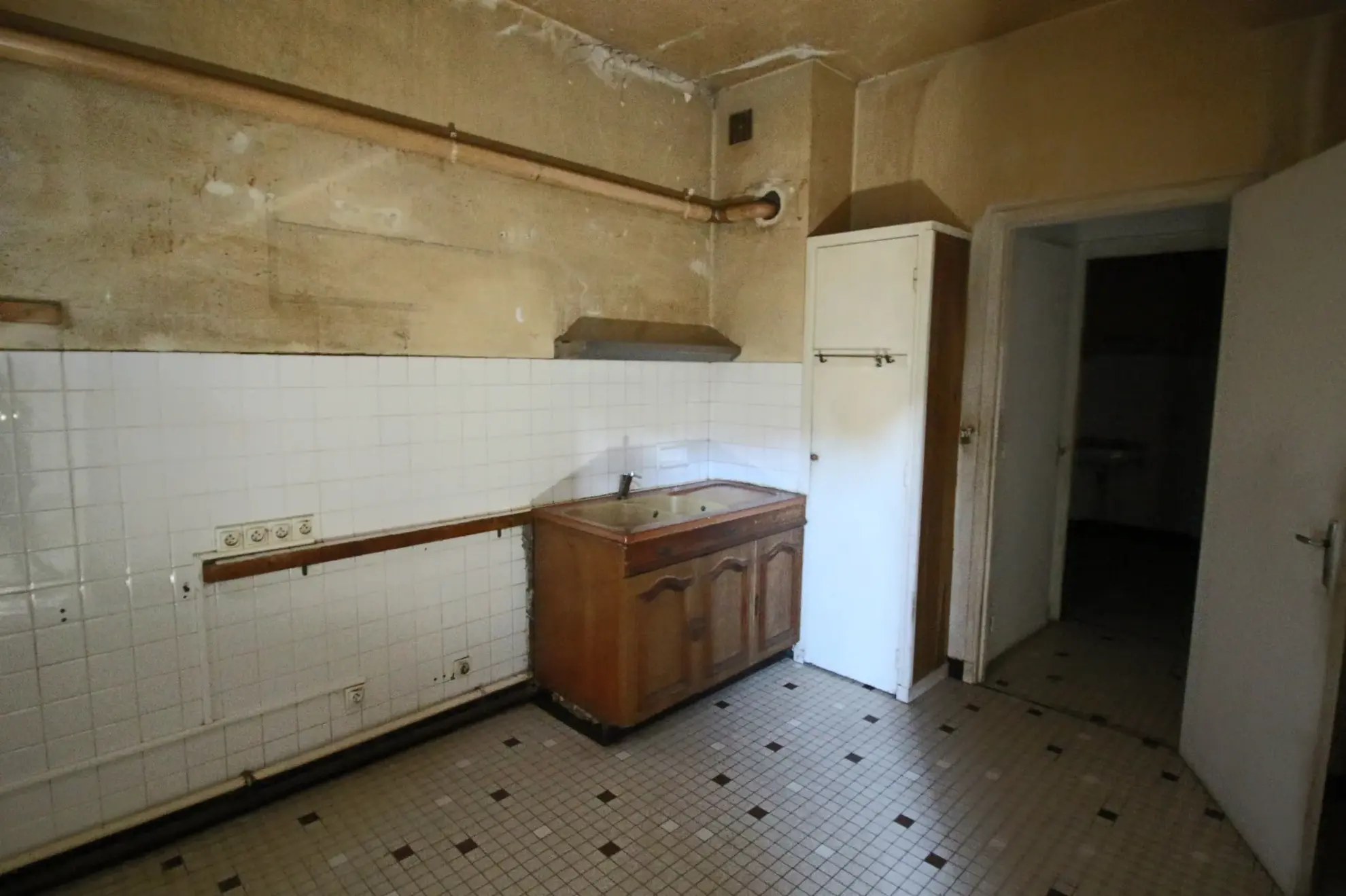 Immeuble à vendre au centre de Puy l'Évêque - Opportunité d'investissement avec revenu locatif 