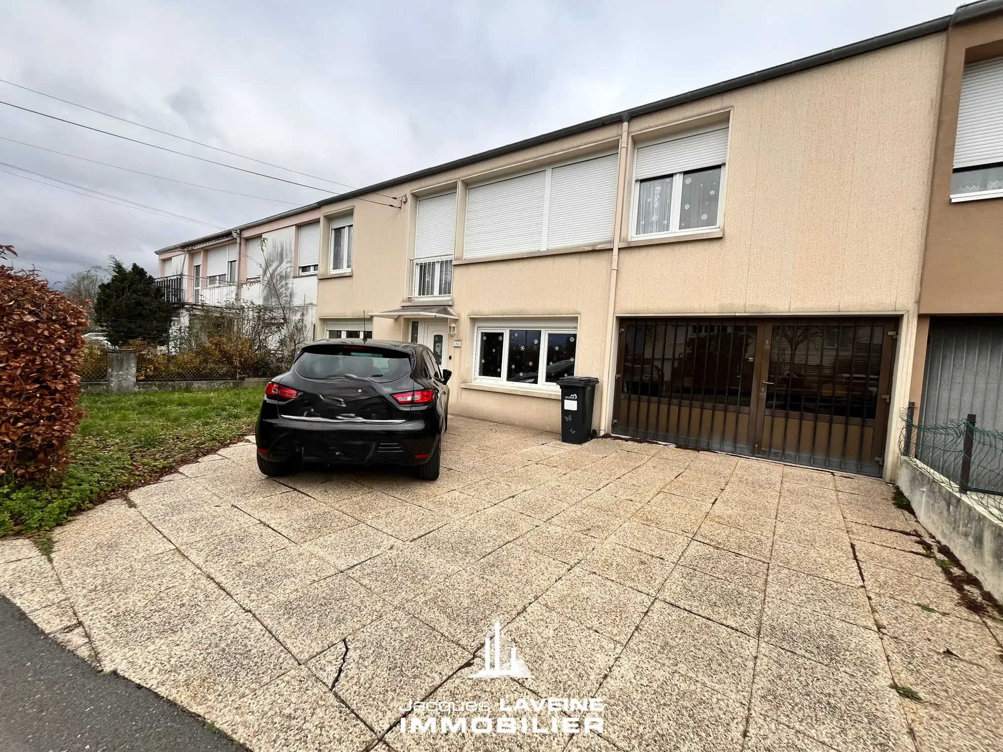 Maison à vendre à Metz avec 4 chambres, garage, jardin et location en cours 