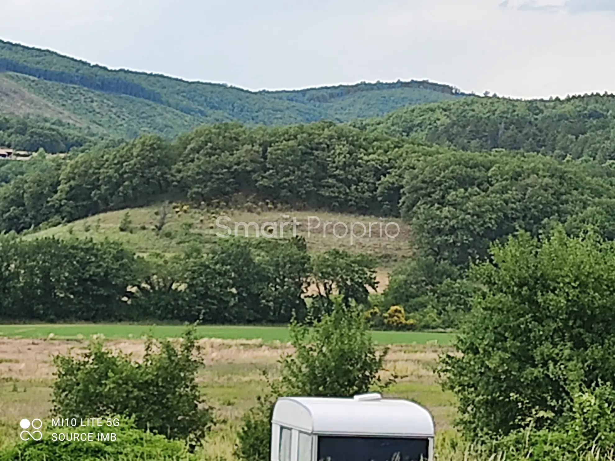 Terrain constructible de 1290 m² à Puy St Martin, environnement calme et dégagé 