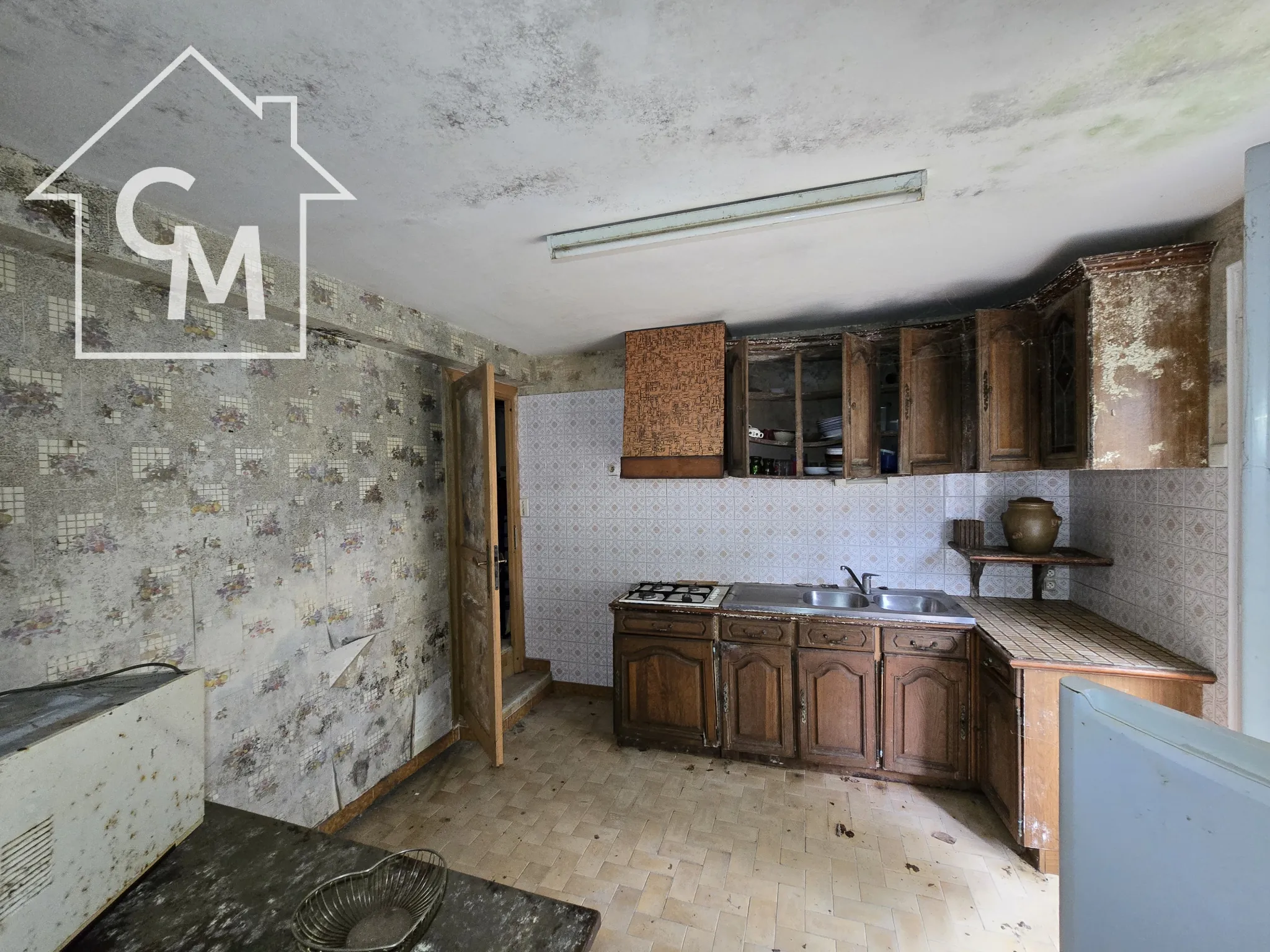 Maison à Cognac avec jardin clôturé et garage – Quartier Saint Martin 