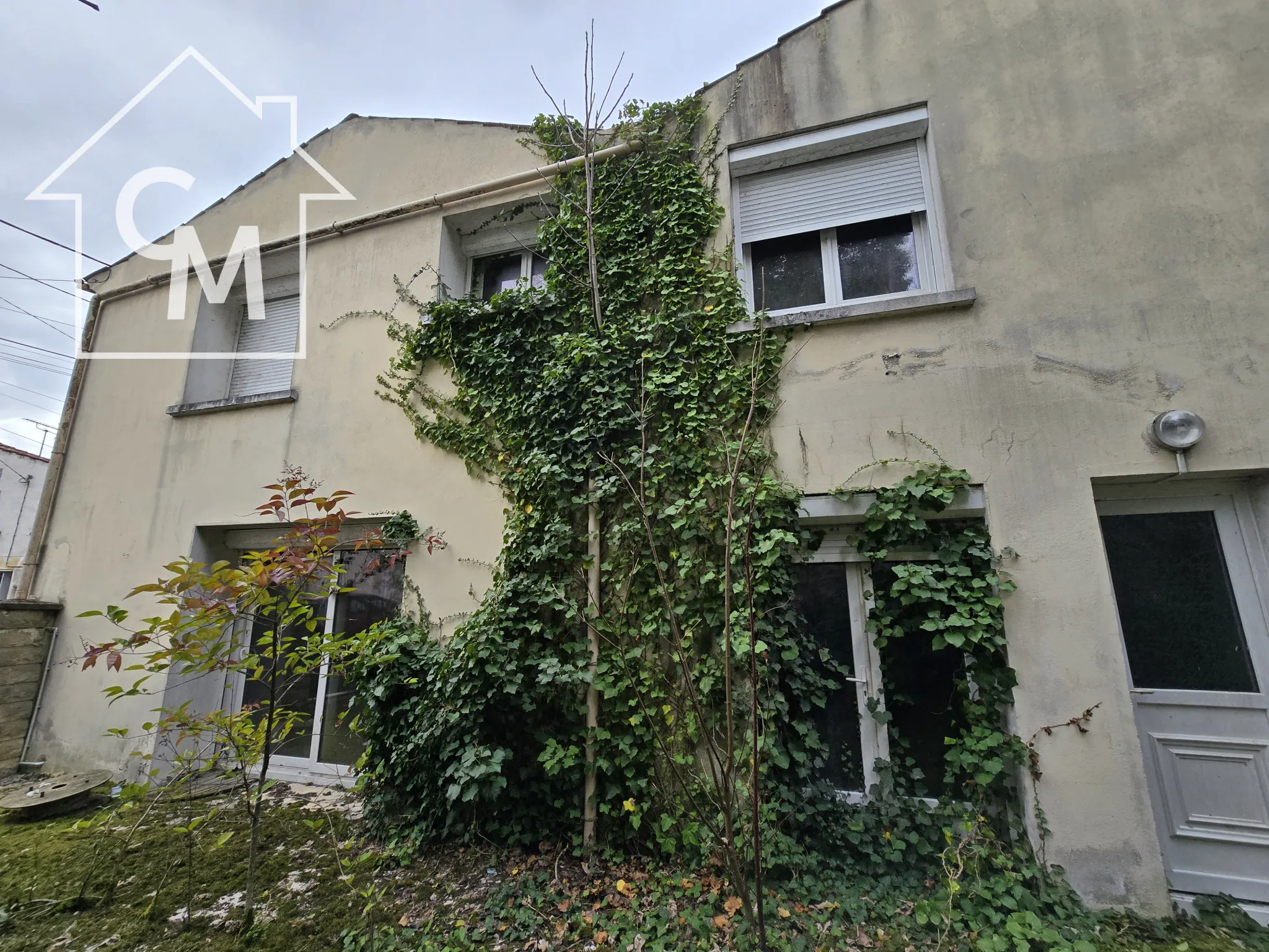 Maison à Cognac avec jardin clôturé et garage – Quartier Saint Martin 