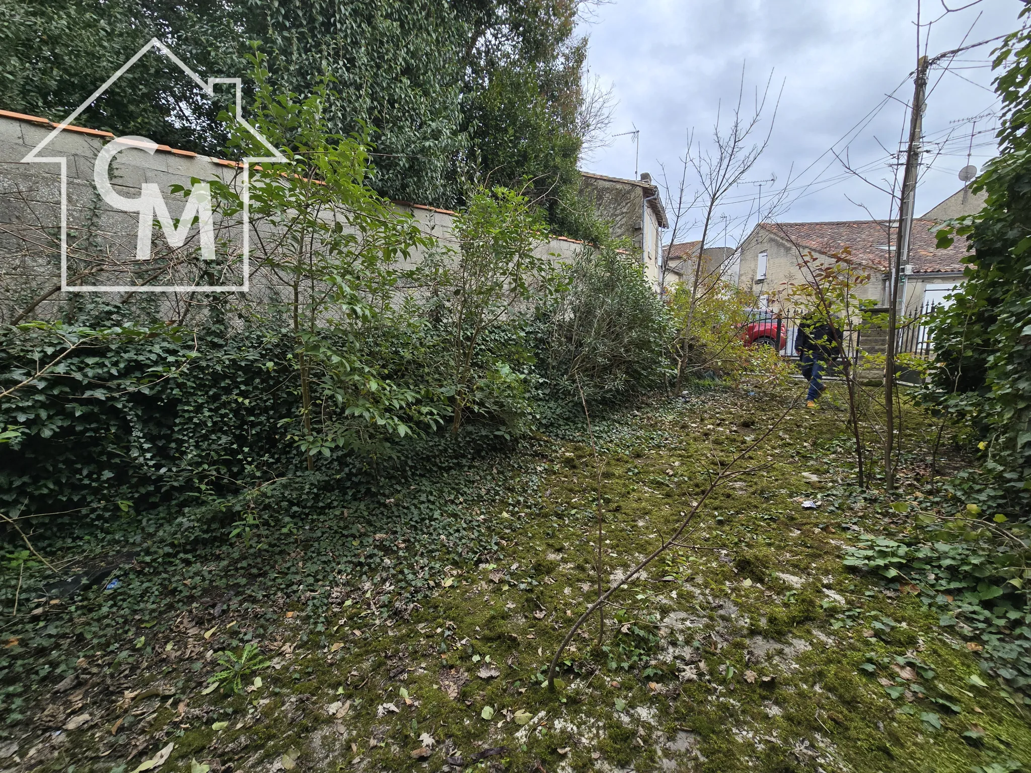 Maison à Cognac avec jardin clôturé et garage – Quartier Saint Martin 