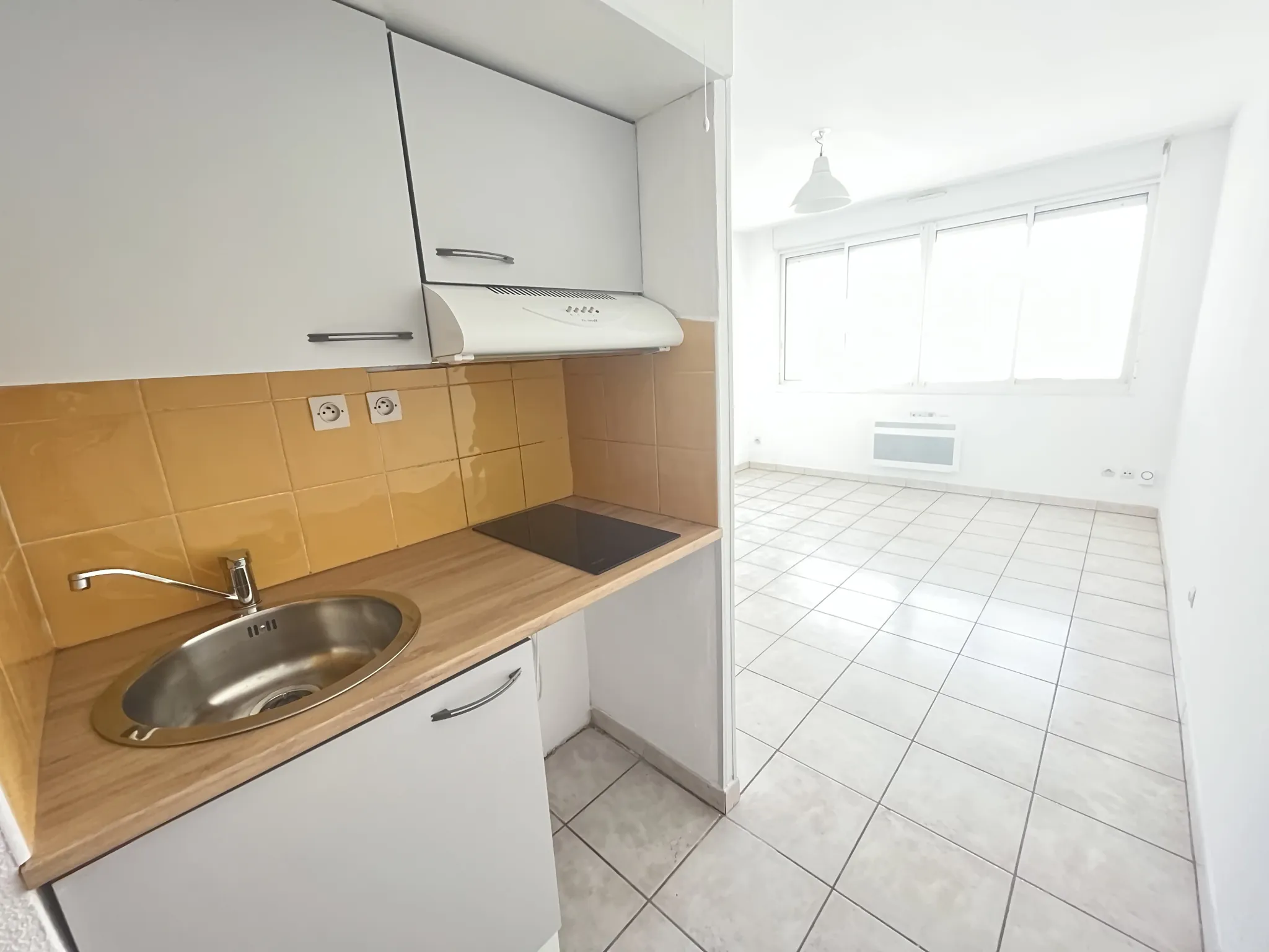 Studio à vendre de 20,23 m² à Perpignan, investissez dans cet appartement loué proche du centre-ville 