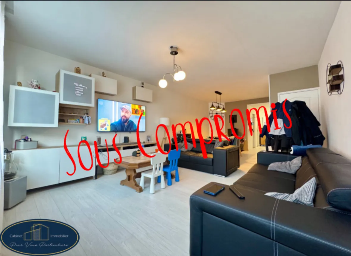 Maison mitoyenne rénovée de 3 chambres à Raismes avec terrasse et jardin