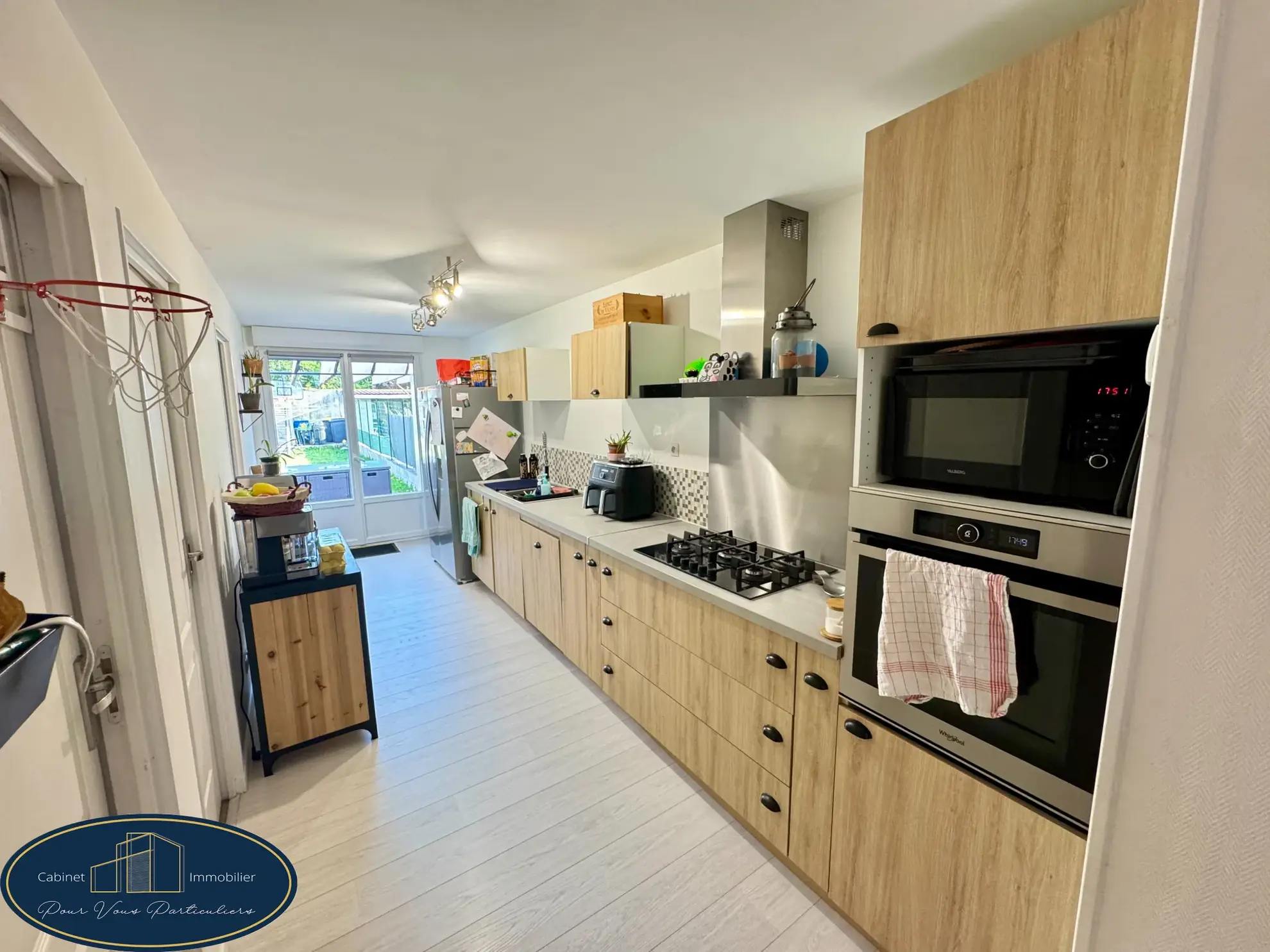 Maison mitoyenne rénovée de 3 chambres à Raismes avec terrasse et jardin 