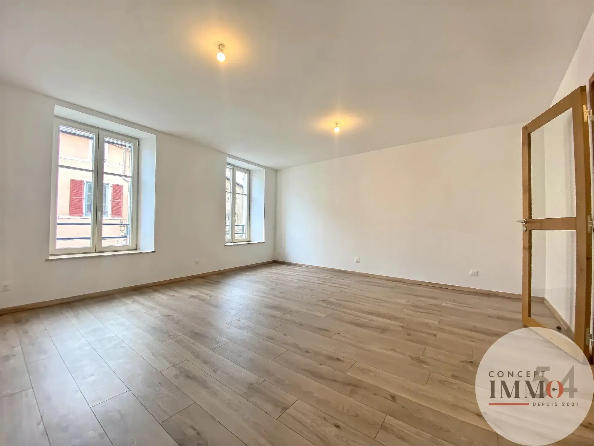 Maison de ville rénovée avec terrasses et garage à Toul - Centre-ville