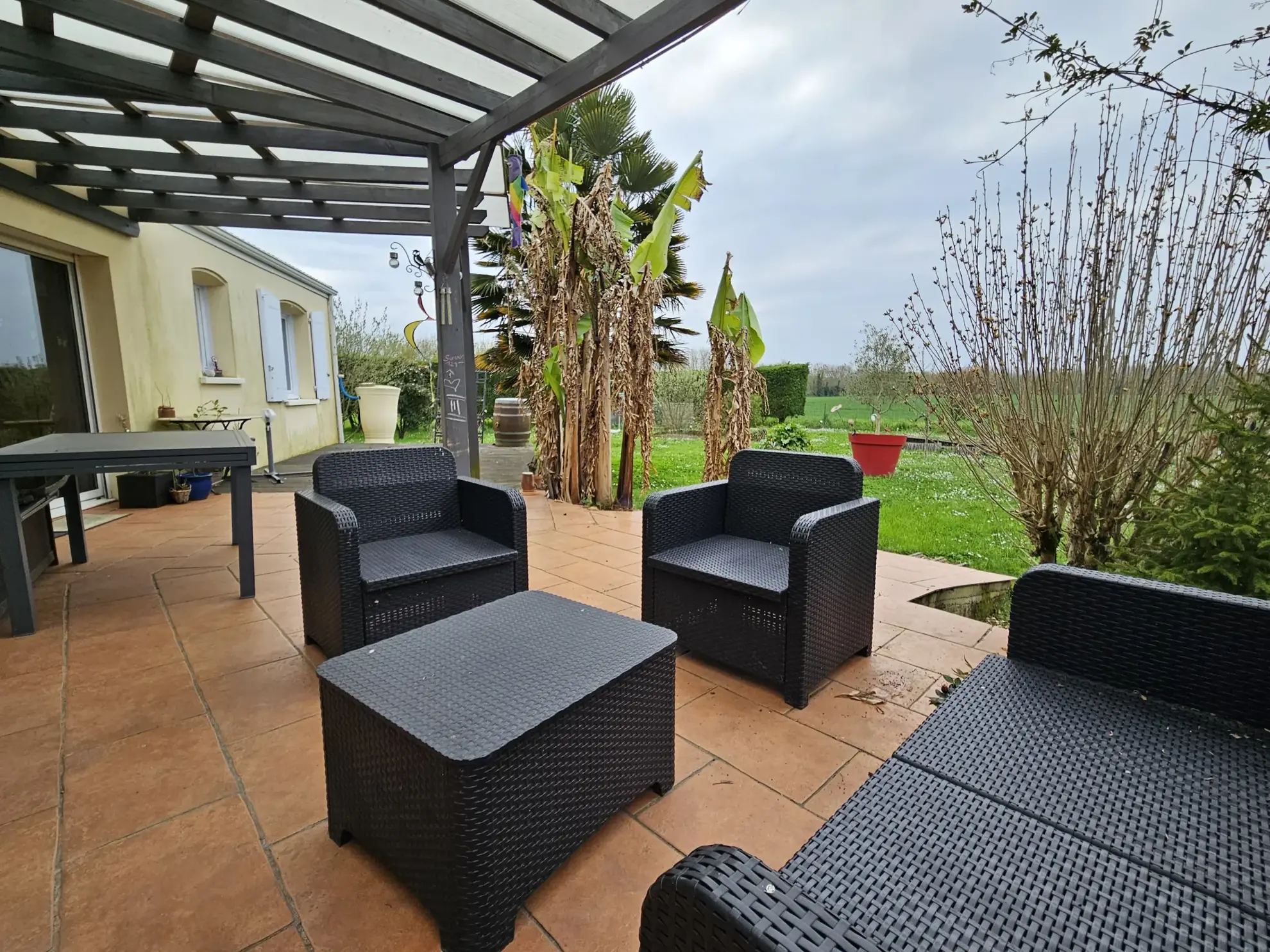 Maison de plain-pied avec 3 chambres, garage et jardin clos à Le Vanneau Irleau 