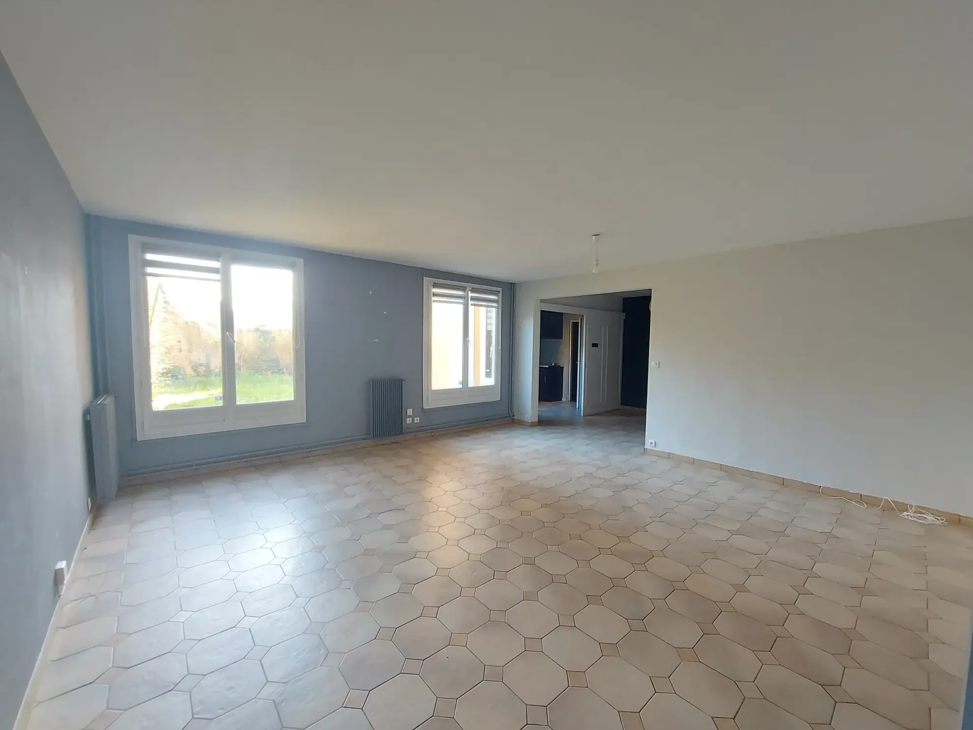 Appartement 4 pièces en duplex avec jardin et garage à Maurepas 