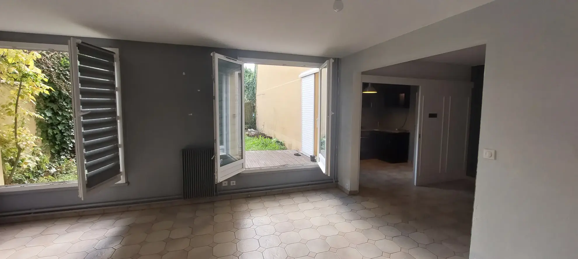 Appartement 4 pièces en duplex avec jardin et garage à Maurepas 