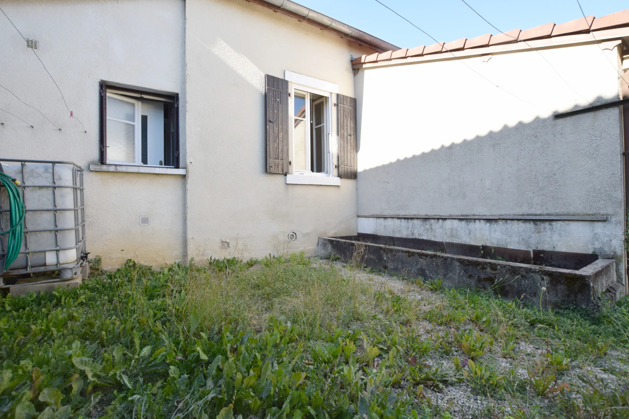 Maison des années 20 à rénover à Grand Charmont - 94 m² sur terrain de 3,02 ares 