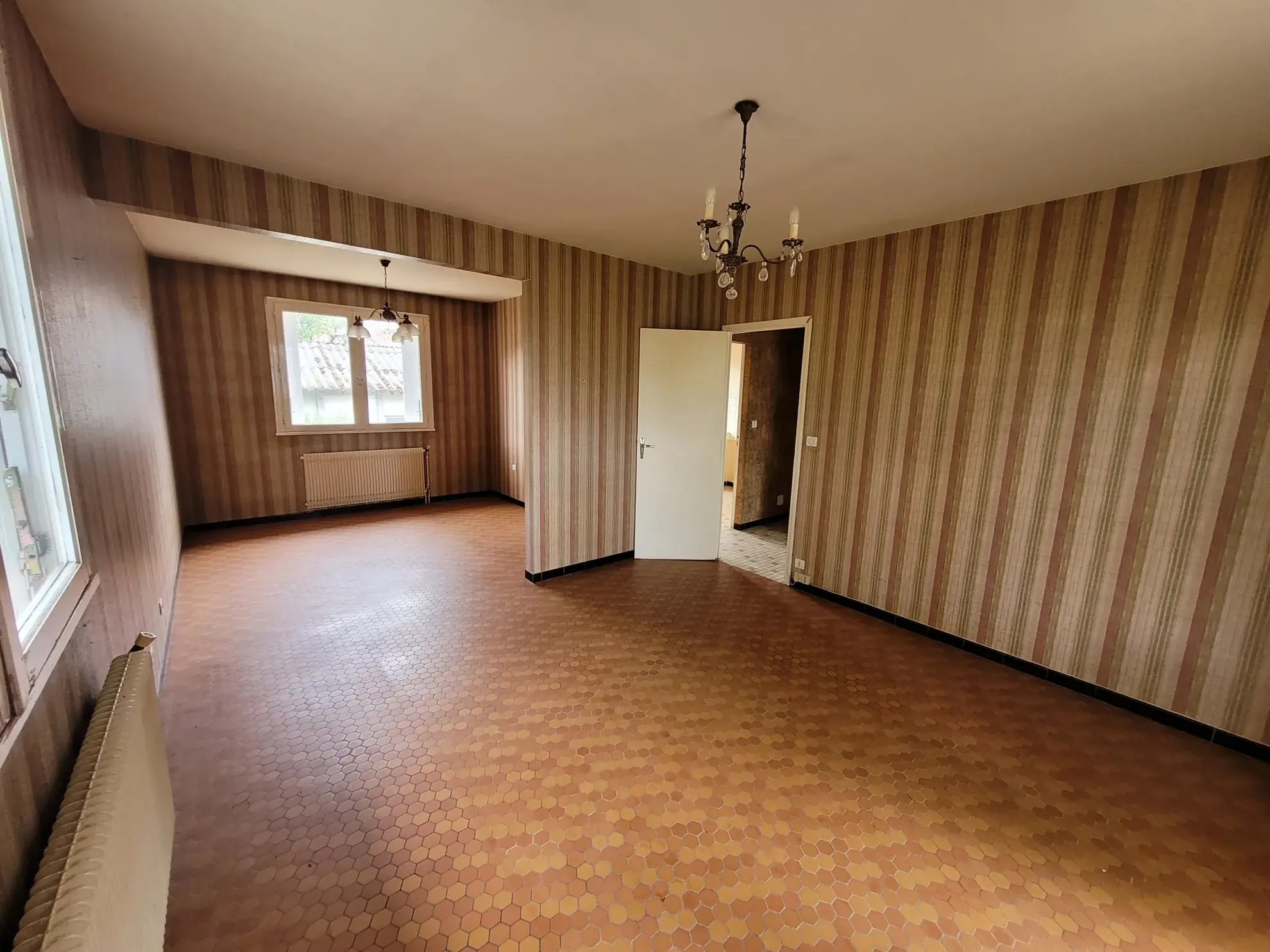 Maison de 2 chambres avec garage et extérieur à Marmande, secteur calme 