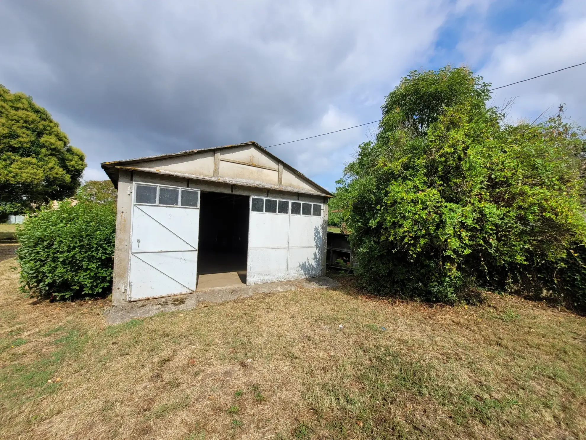 Maison de 2 chambres avec garage et extérieur à Marmande, secteur calme 