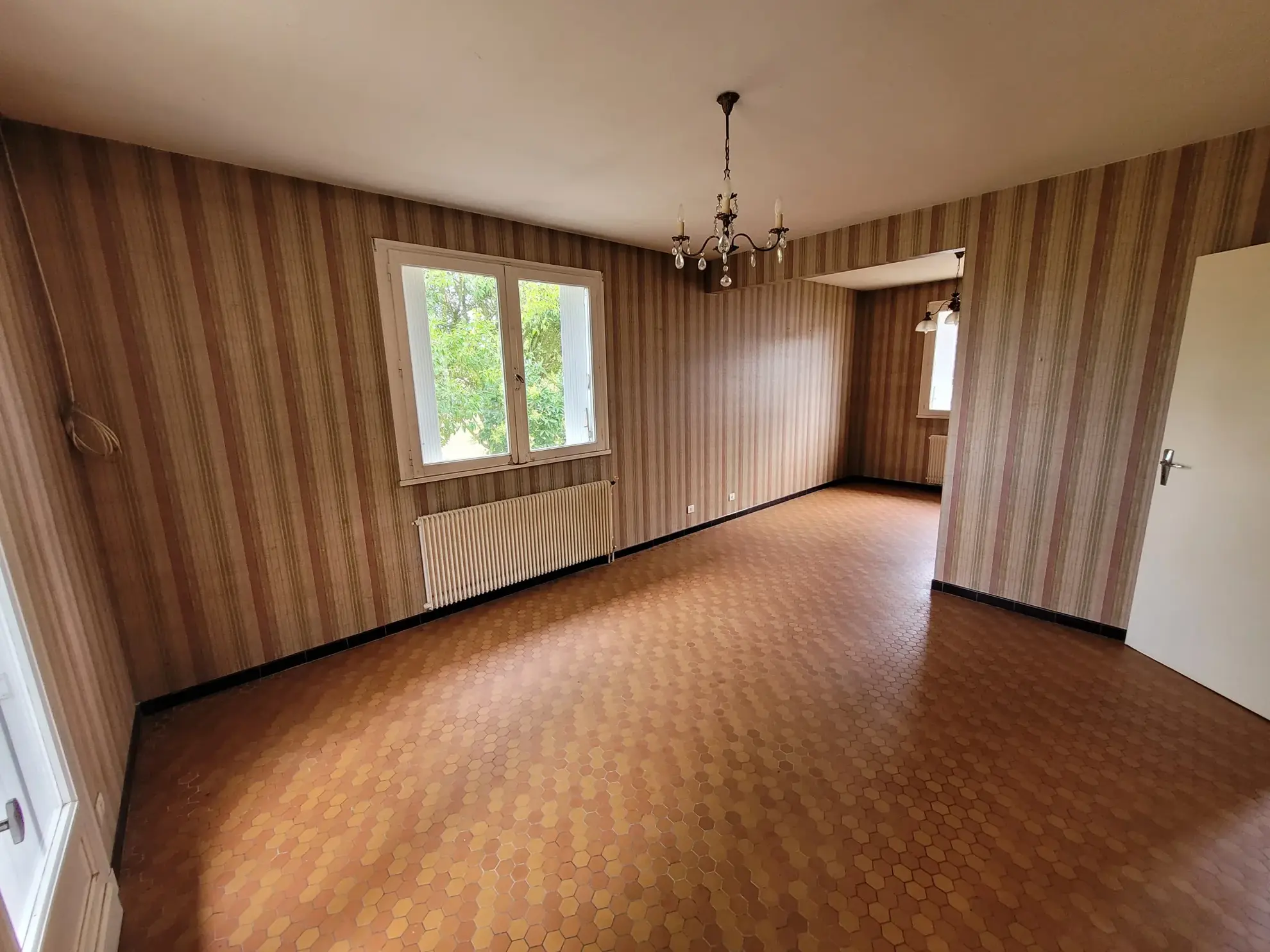 Maison de 2 chambres avec garage et extérieur à Marmande, secteur calme 