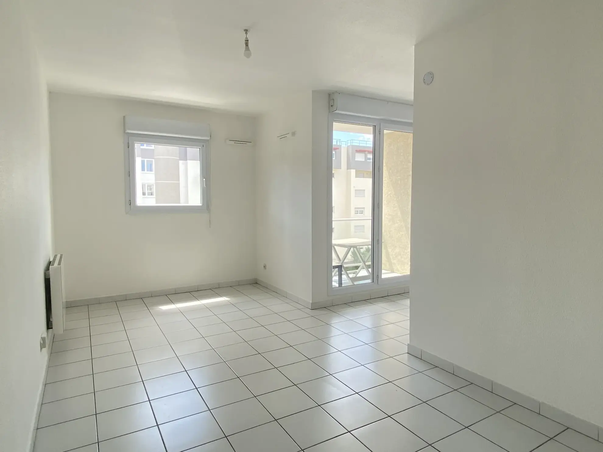 Appartement T1 bis à Perpignan avec balcon, sécurité et proximité centre-ville 