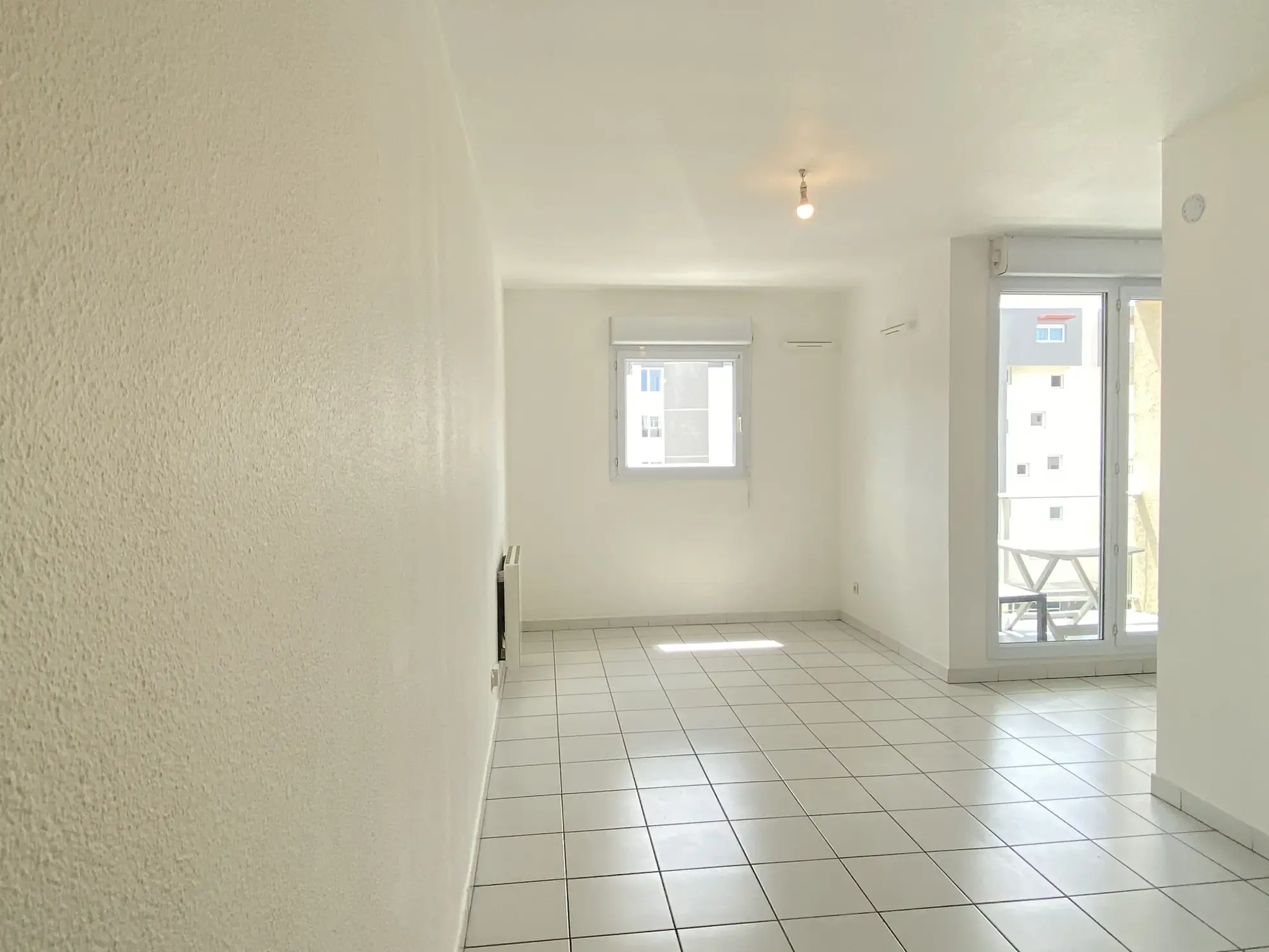 Appartement T1 bis à Perpignan avec balcon, sécurité et proximité centre-ville 