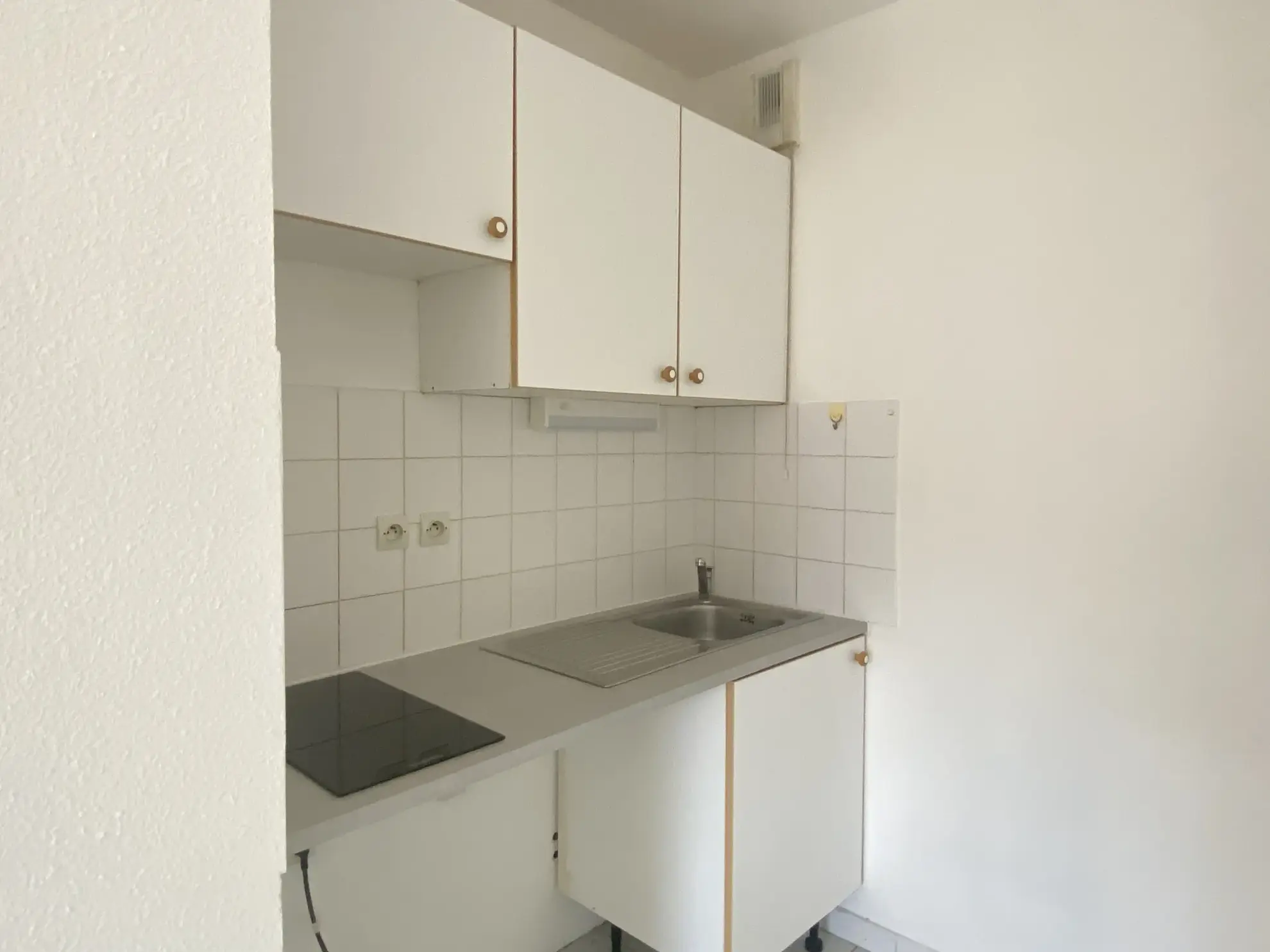 Appartement T1 bis à Perpignan avec balcon, sécurité et proximité centre-ville 