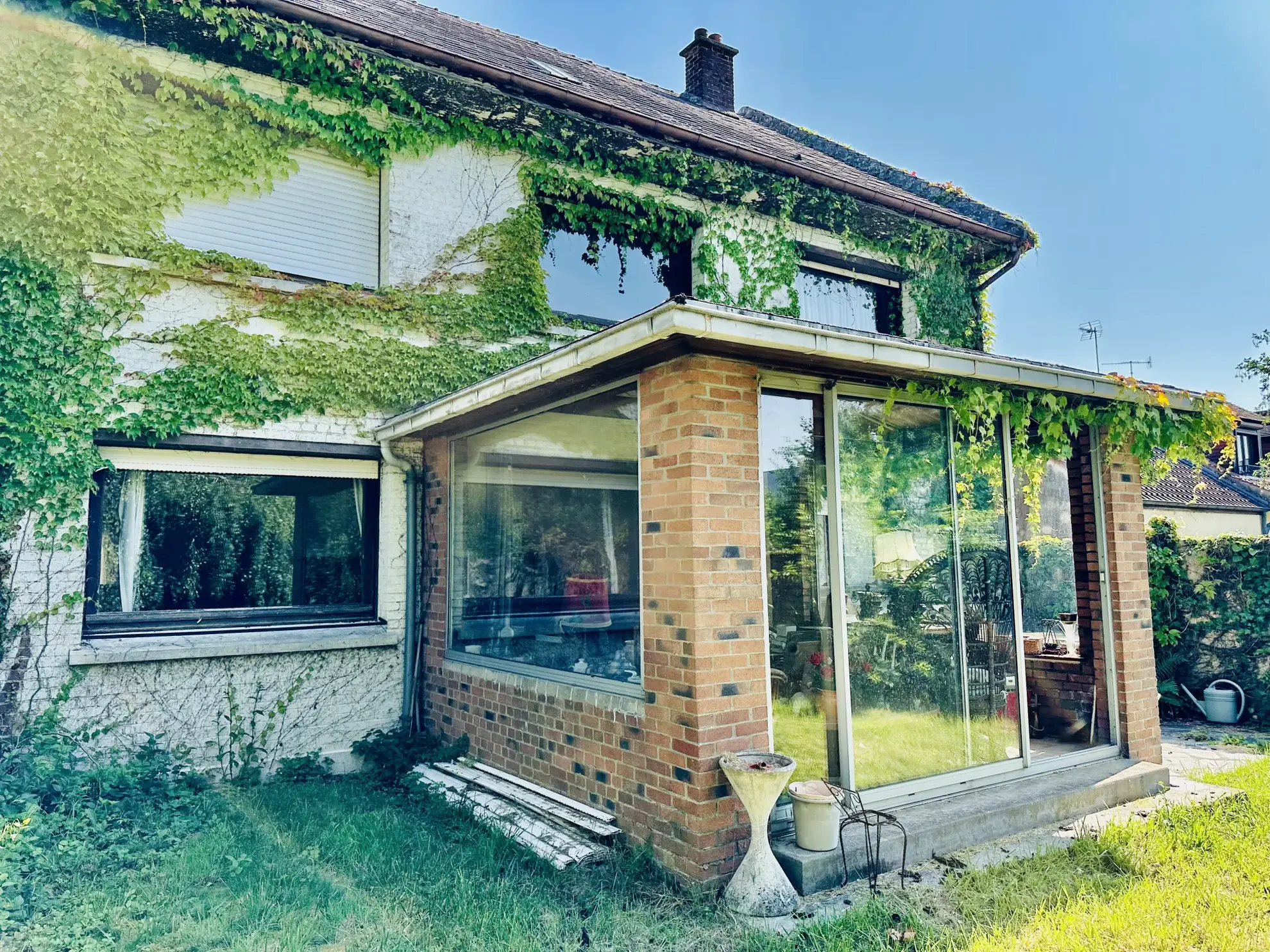 Belle maison familiale à Caudry avec 5 chambres et grand jardin, potentiel de rénovation 