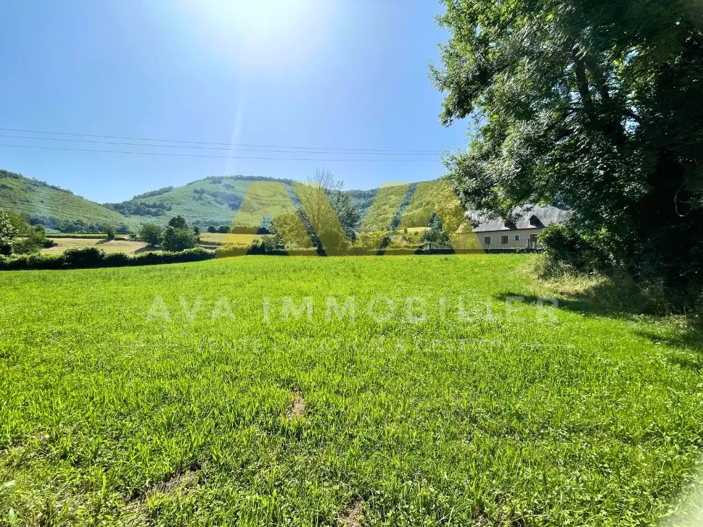 Terrain constructible de 3547 m² proche de Tardets - Projet résidentiel en environnement calme