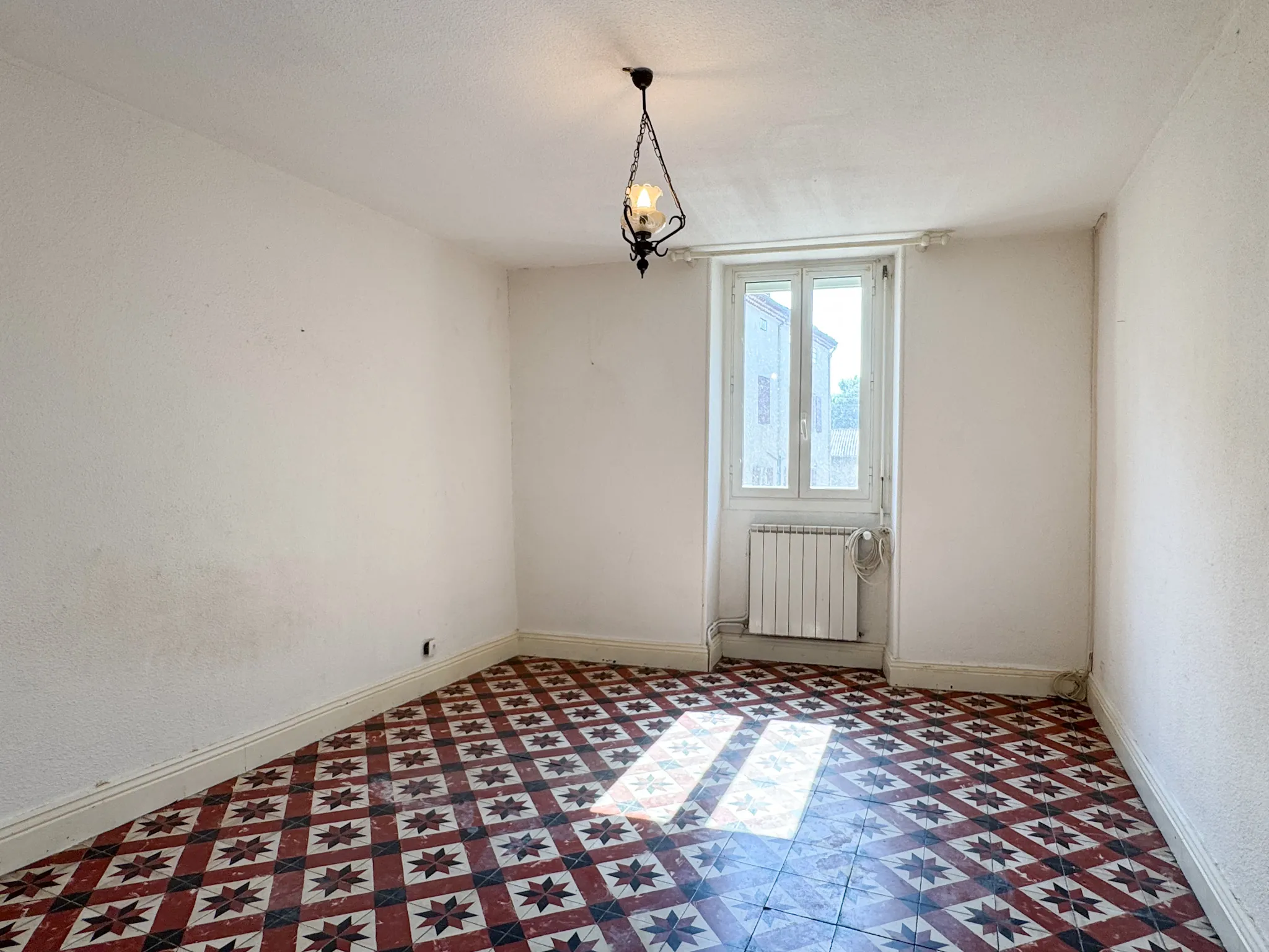 Maison de rapport de 138 m² avec 2 appartements et garages au Pouzin 