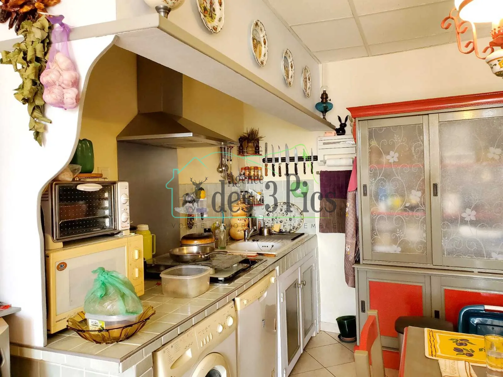 Ensemble immobilier à Caumont avec deux maisons, potentiel locatif et dépendances 