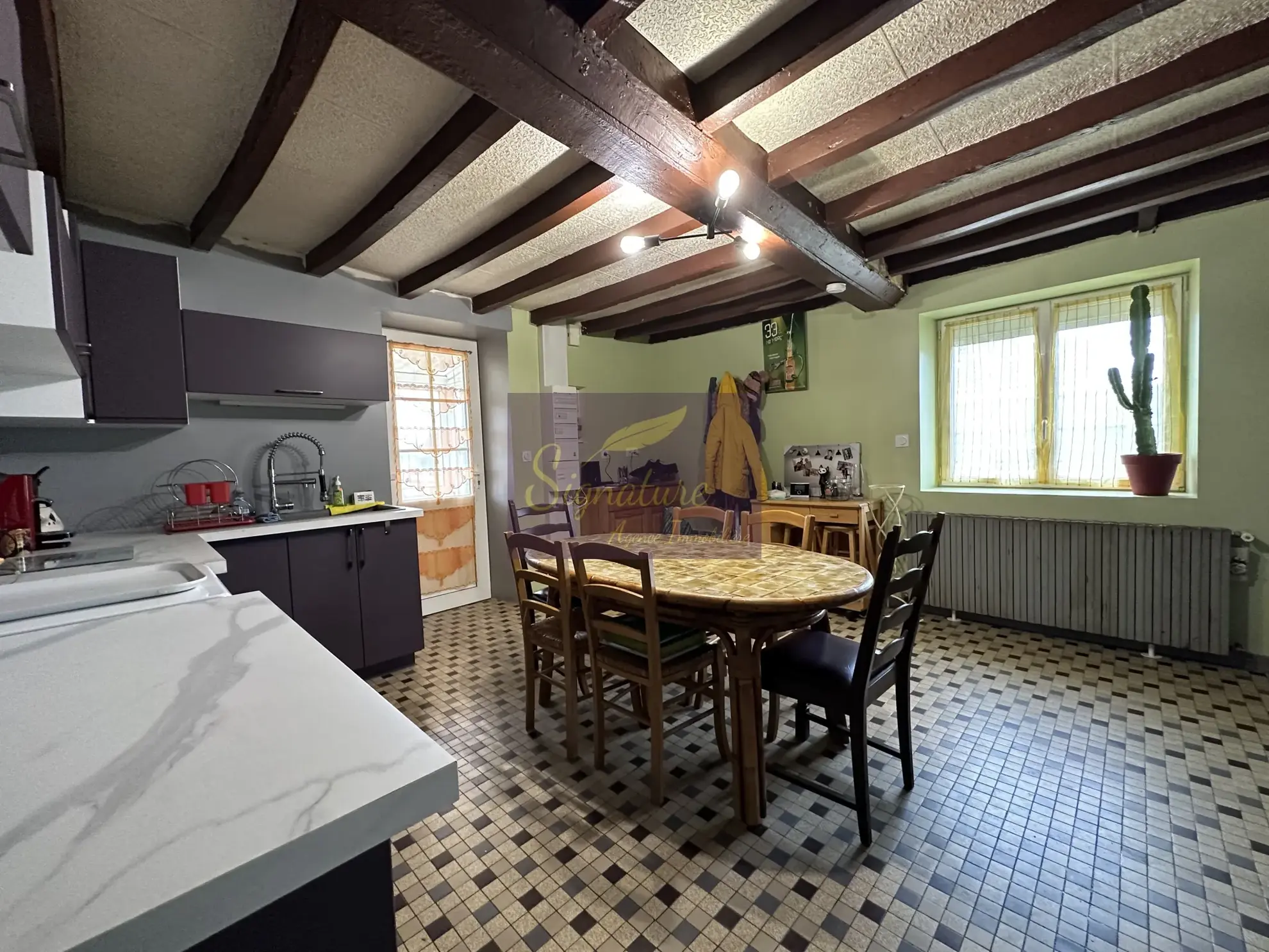 Charmante maison de plain-pied avec jardin et garage à Louplande