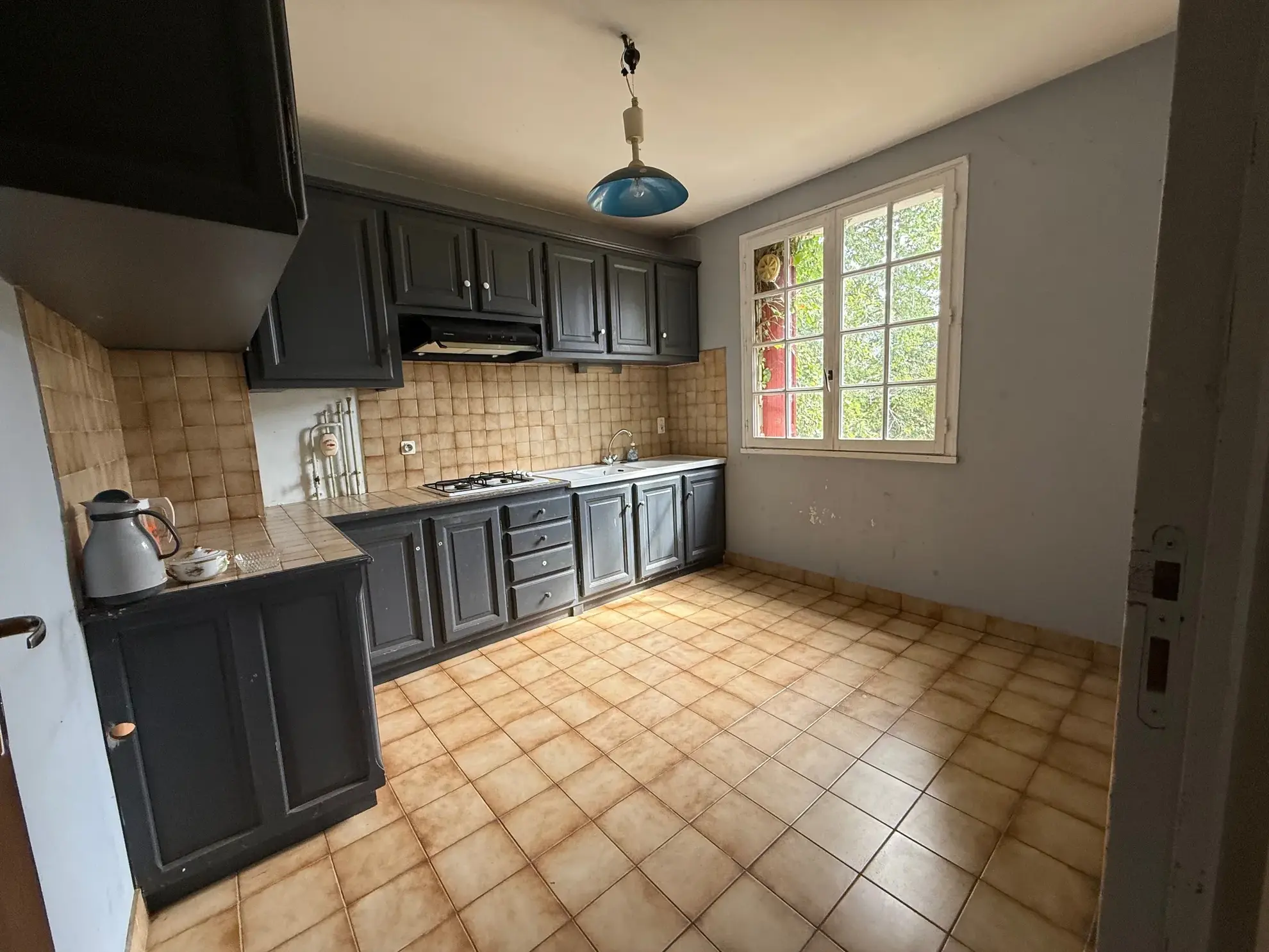 Belle propriété à Lacapelle Biron avec deux maisons, terrain de 4000 m² et multiples possibilités d’aménagement 