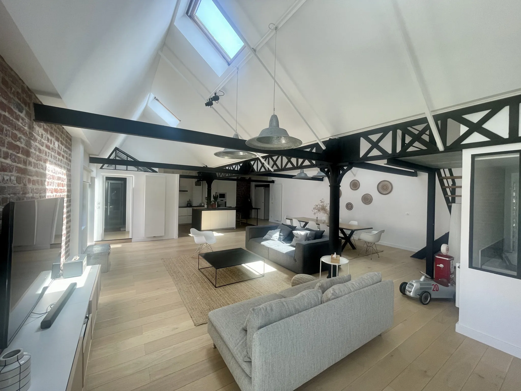Magnifique loft à vendre à Tourcoing avec terrasse, parking sécurisé et charme industriel 