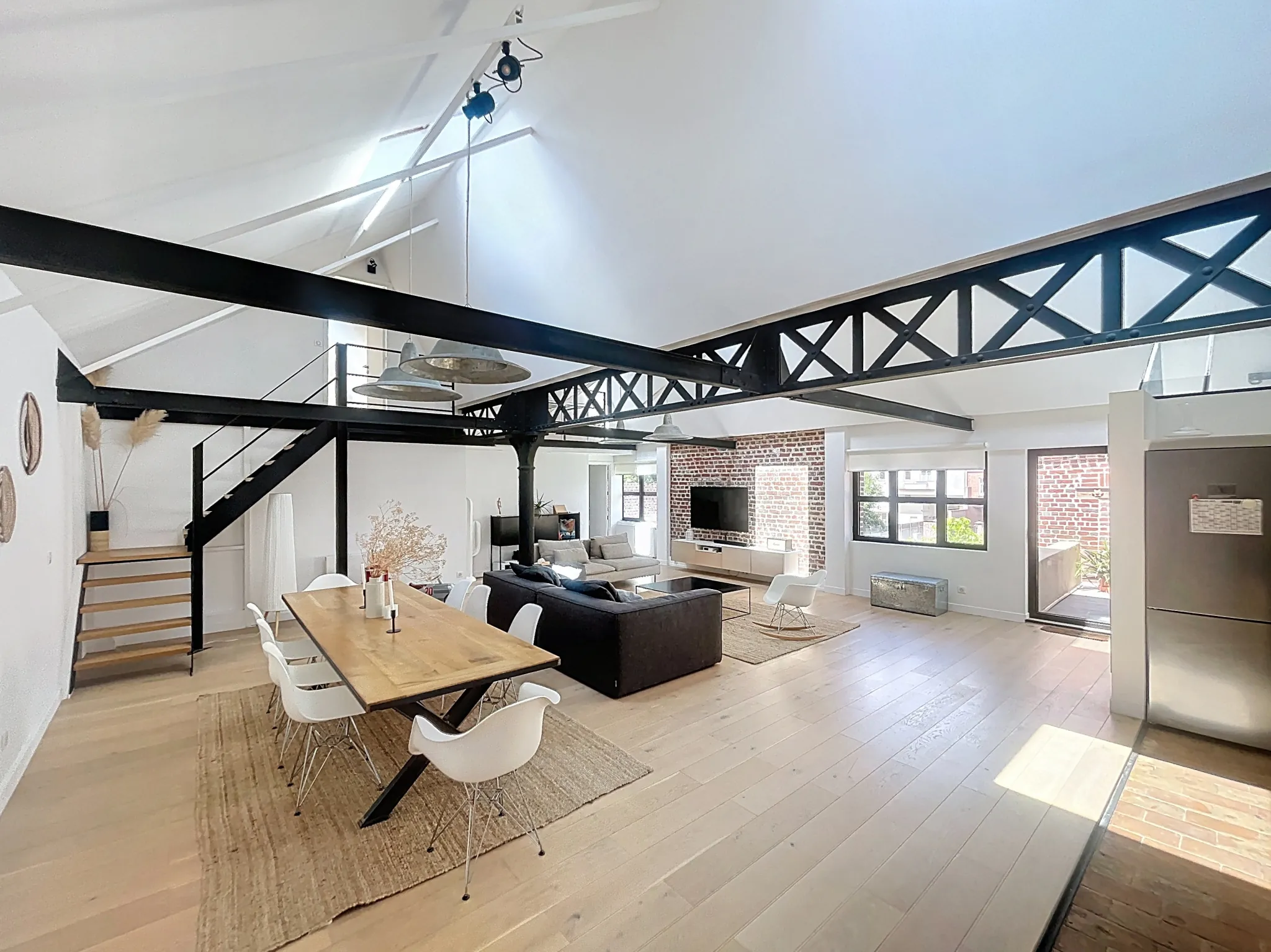 Magnifique loft à vendre à Tourcoing avec terrasse, parking sécurisé et charme industriel