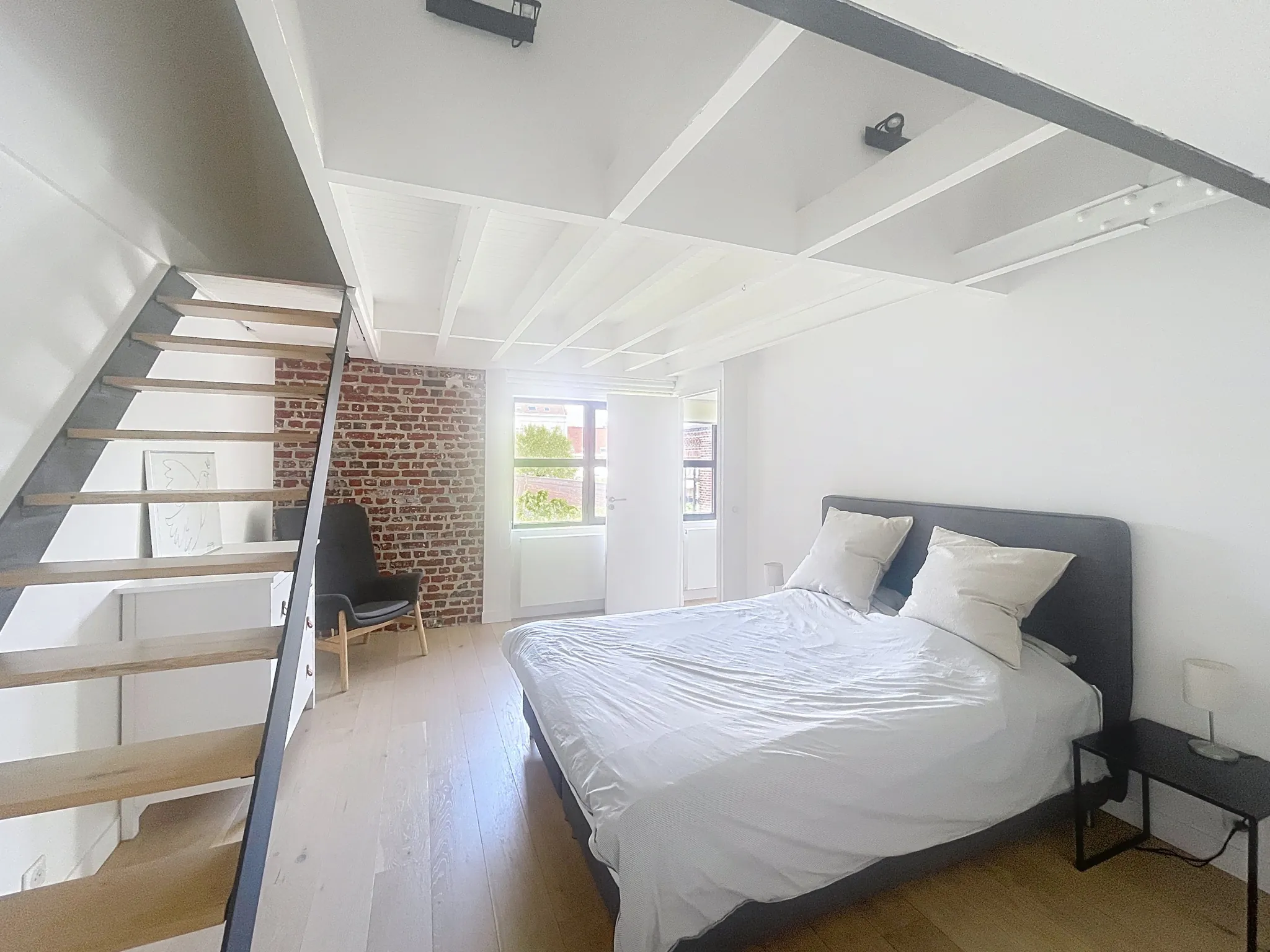 Magnifique loft à vendre à Tourcoing avec terrasse, parking sécurisé et charme industriel 