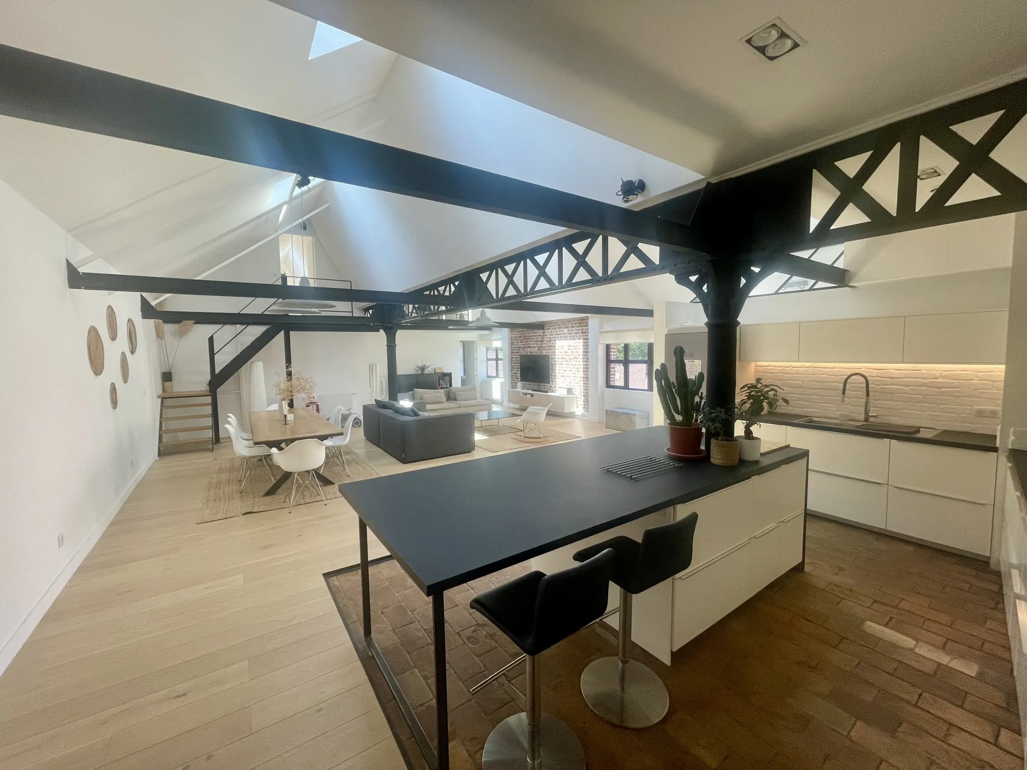 Magnifique loft à vendre à Tourcoing avec terrasse, parking sécurisé et charme industriel 