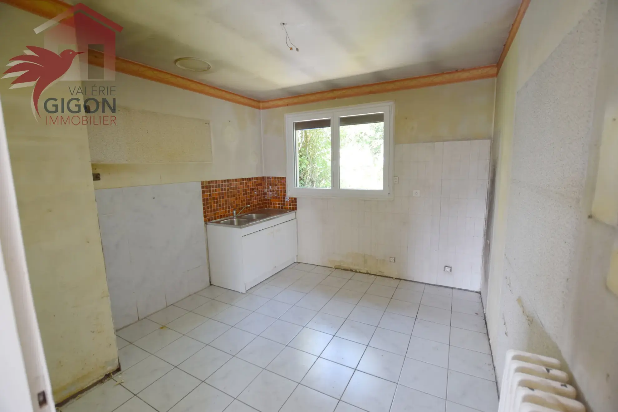 Maison de plain-pied à Audincourt avec potentiel de rénovation et jardin 