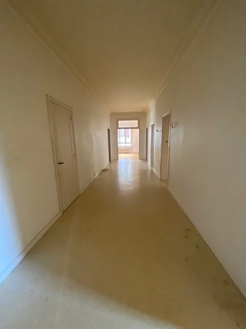 Appartement T6 à Belfort avec jardin et parking - Rénovation à prévoir 