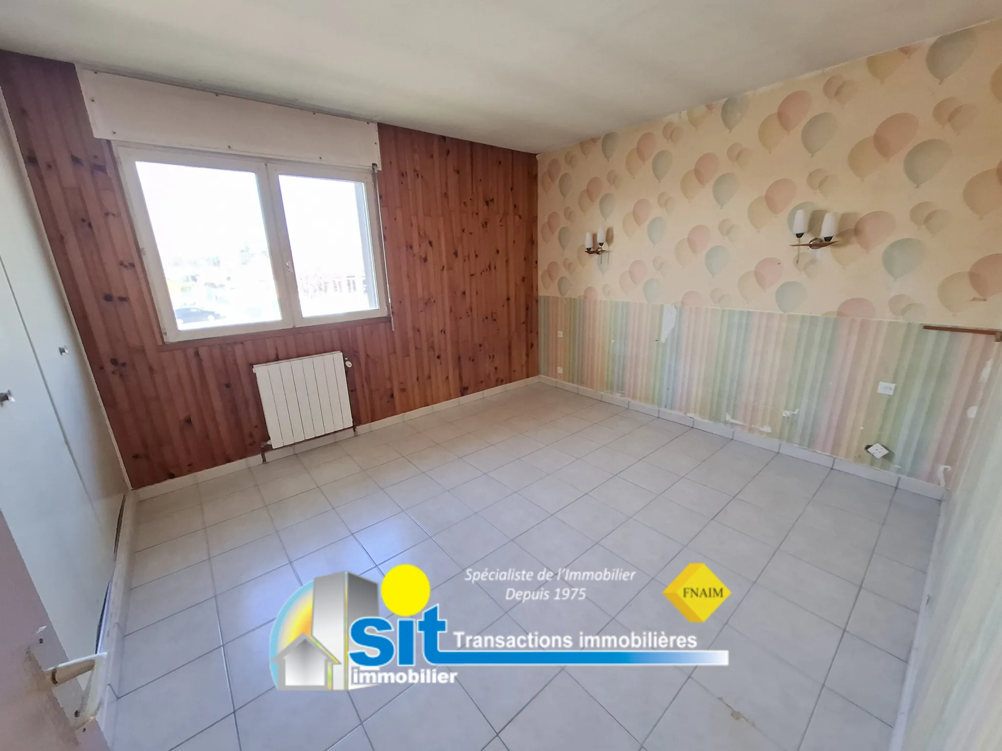 Maison traditionnelle de 162 m² avec potentiel de rénovation à Saint-Clair-du-Rhône 