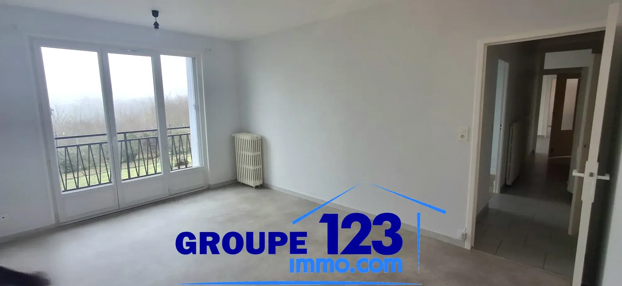 Ensemble immobilier à Auxerre avec deux maisons jumelées, jardin et stationnements 