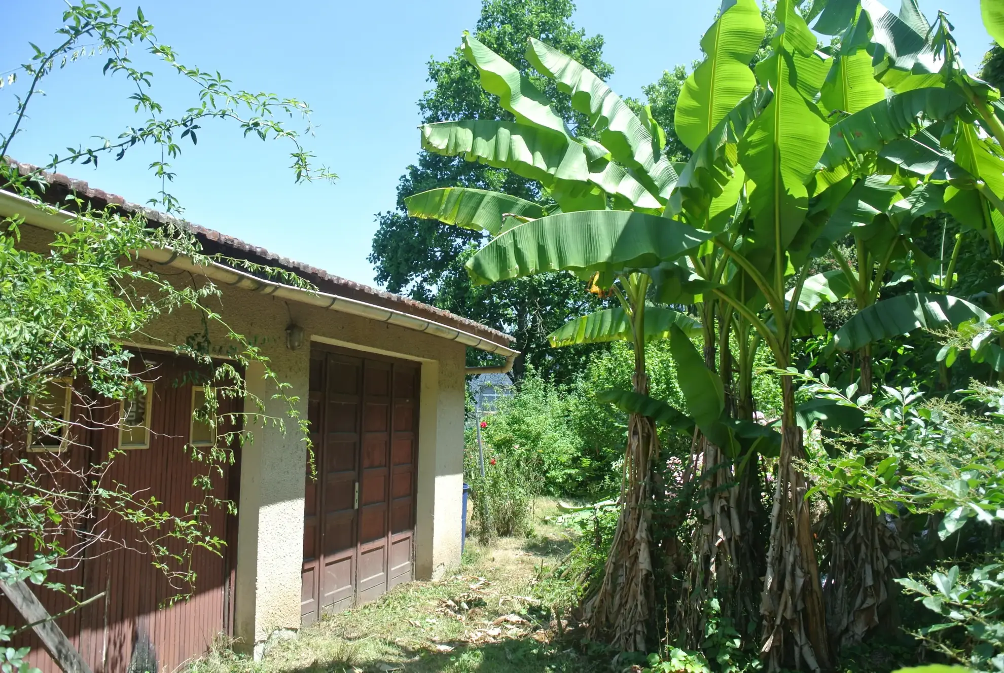 Maison à rénover avec jardin et double garage à Marmande 