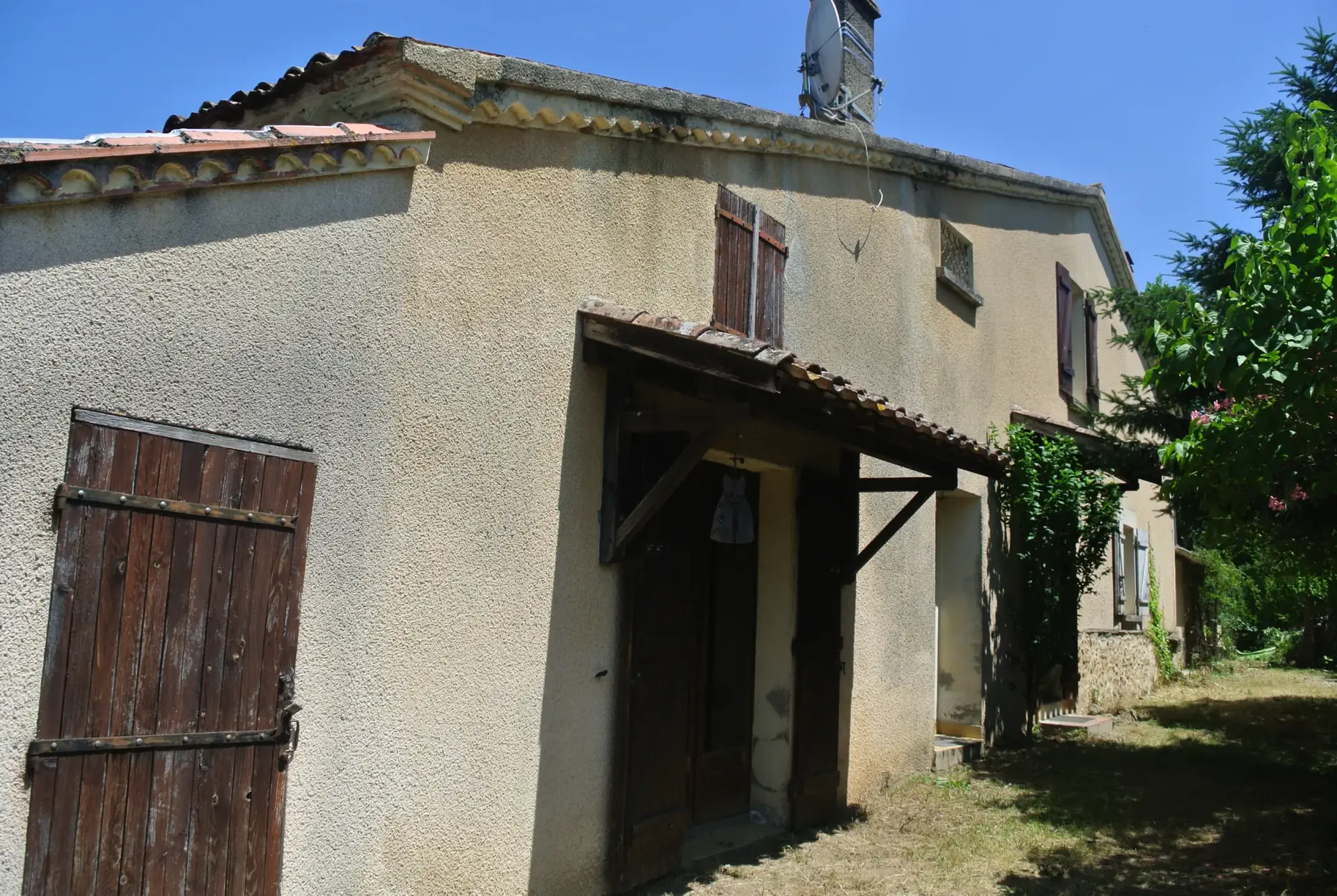 Maison à rénover avec jardin et double garage à Marmande 