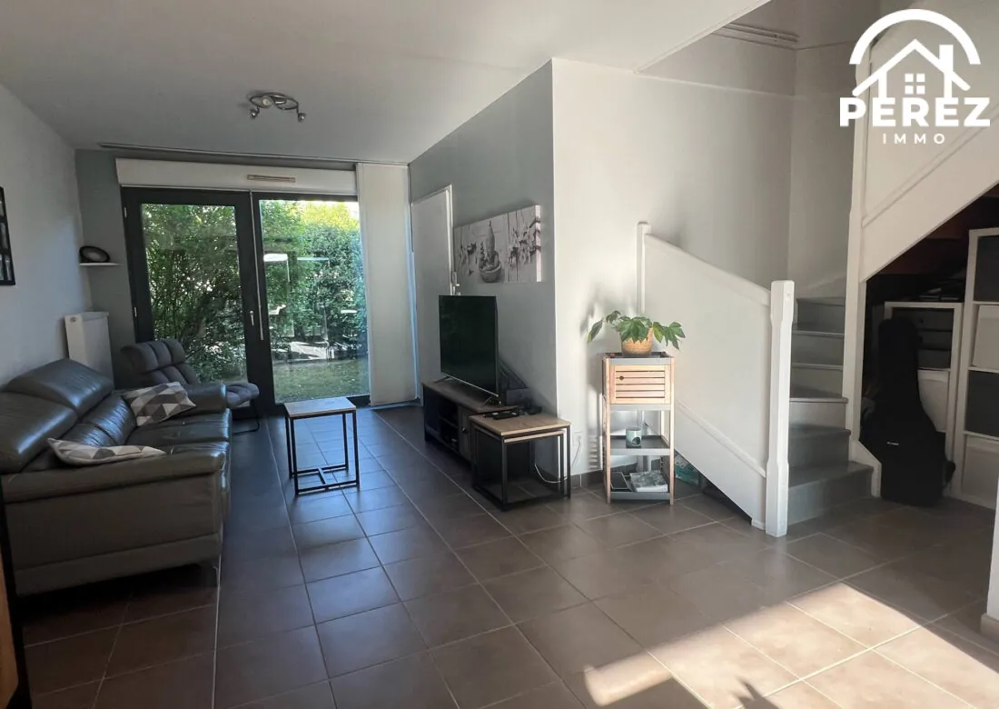 Maison familiale récente de 83 m² avec jardin et garage à Comines 