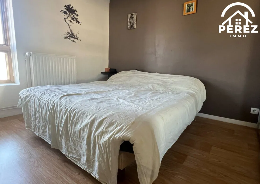 Maison familiale récente de 83 m² avec jardin et garage à Comines 